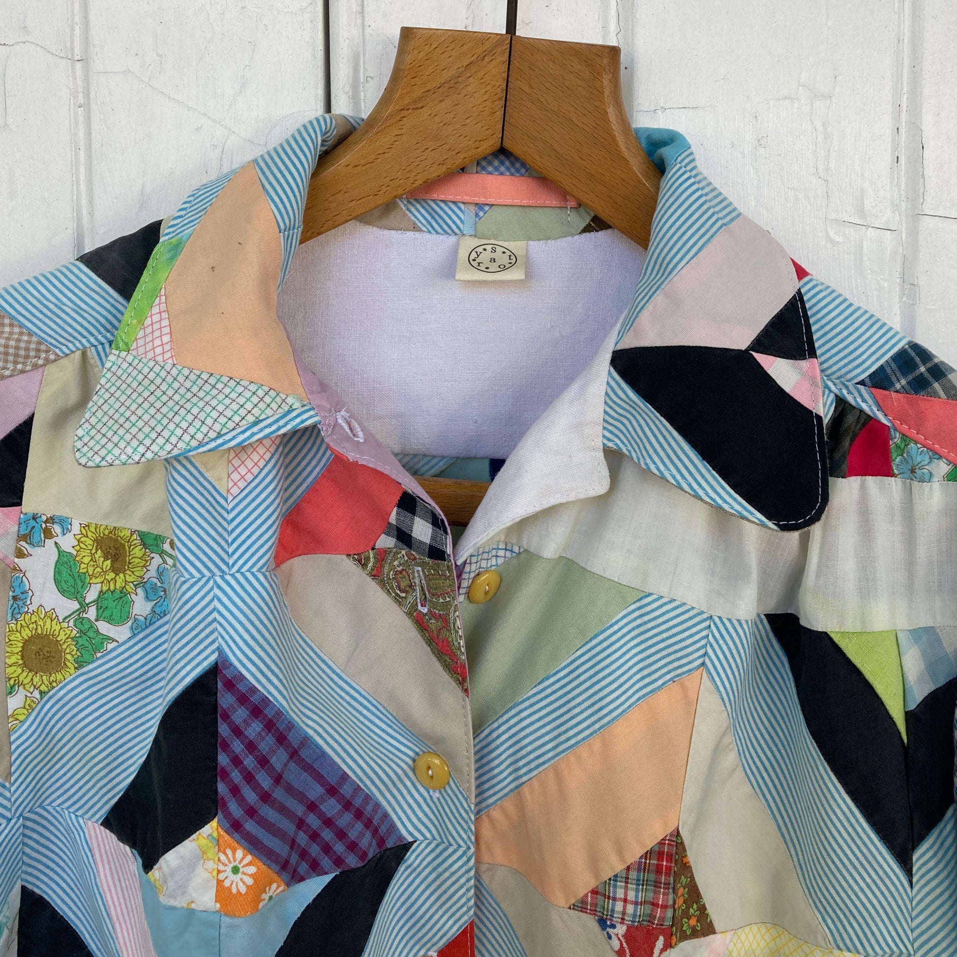 Short-sleeved shirt made from a found piece of 60s/70s patchwork in various bright and pastel colours