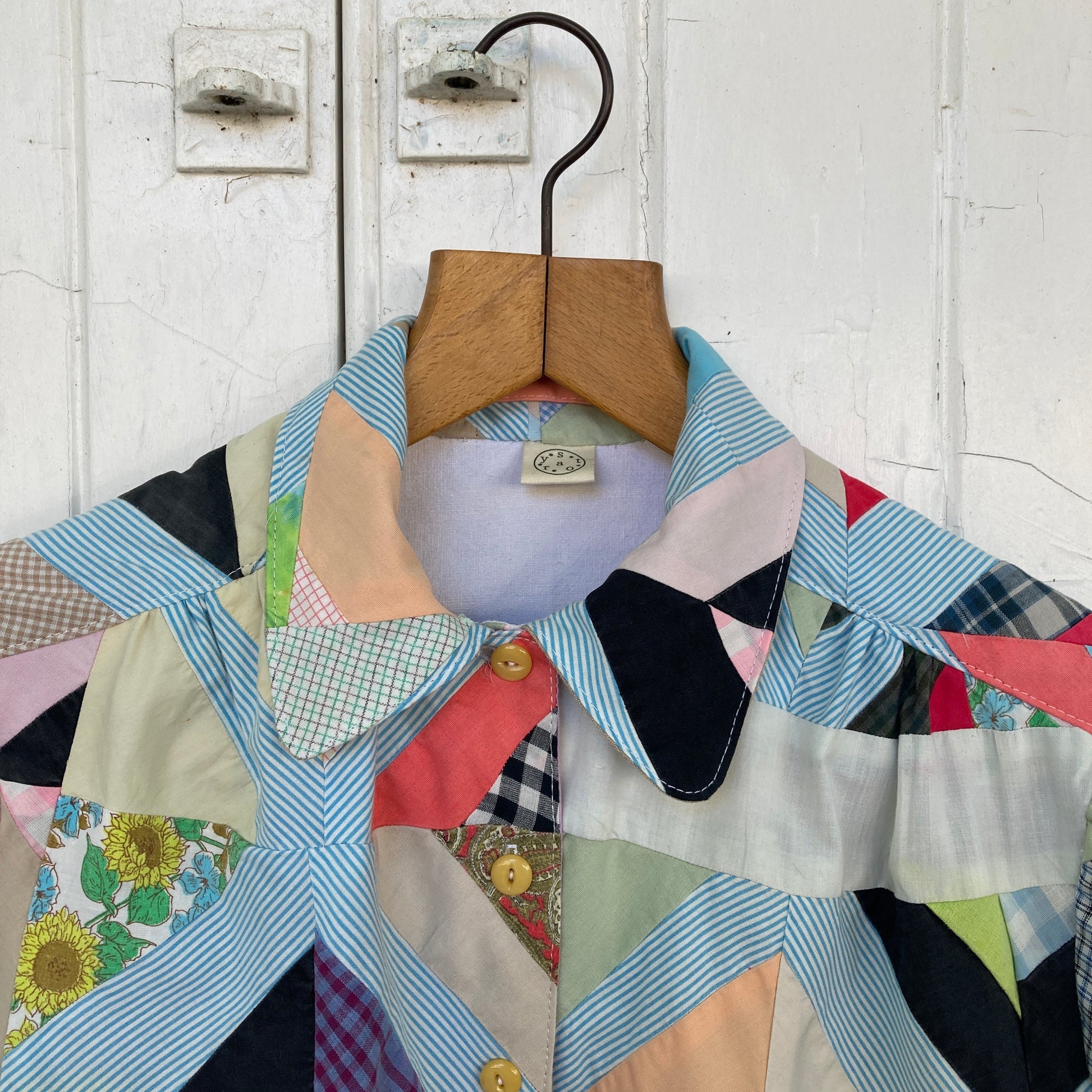 Short-sleeved shirt made from a found piece of 60s/70s patchwork in various bright and pastel colours