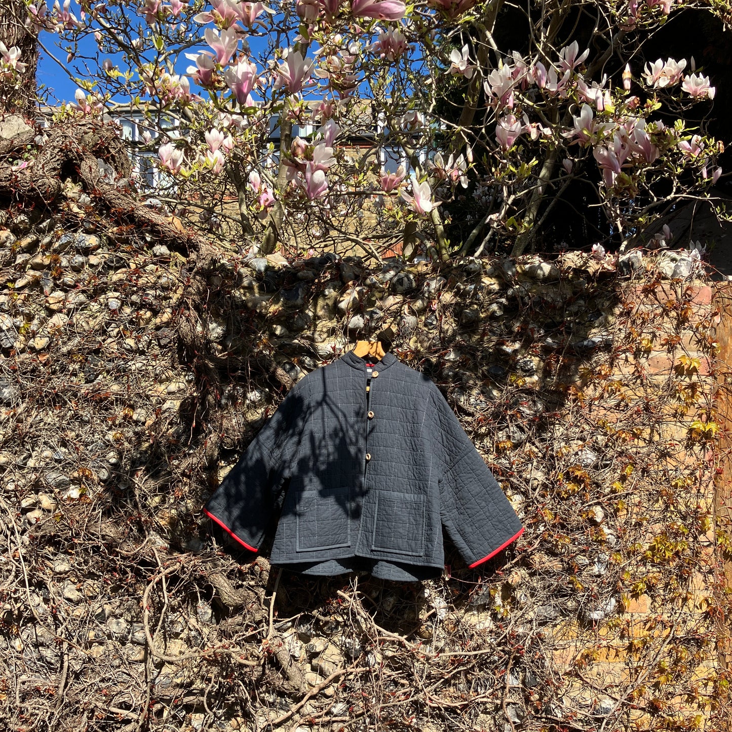 Handmade black recycled quilt jacket