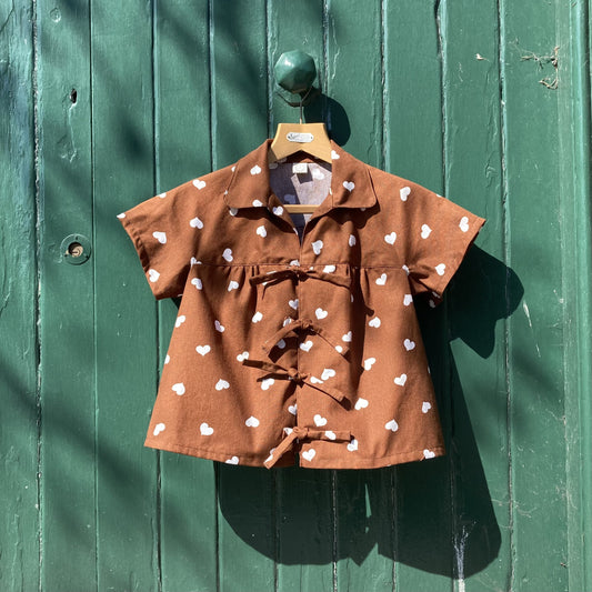brown heart-print tie front top made from a recycled tablecloth