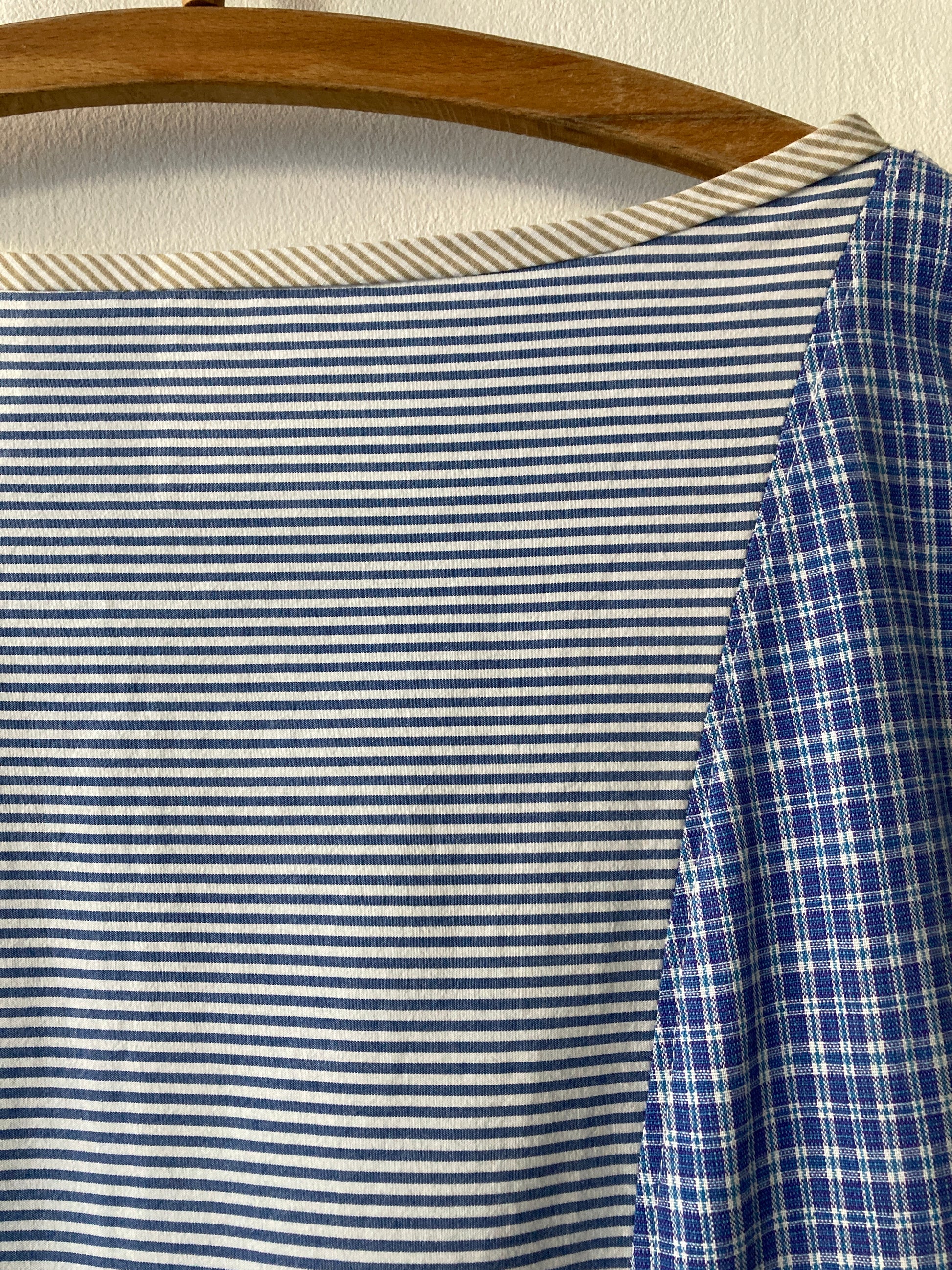 Handmade patchwork dress made from recycled cotton shirts using a vintage 1980s pattern. Boat neck. Pocket on bodice. Drop waist (close-up of sleeve)