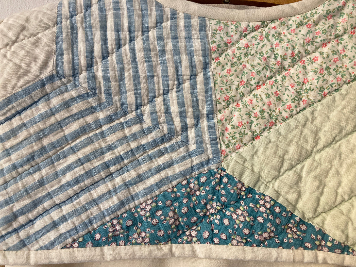 Boxy short-sleeved top made from found calico with a sailor collar cut from an antique patchwork quilt (close-up of collar)