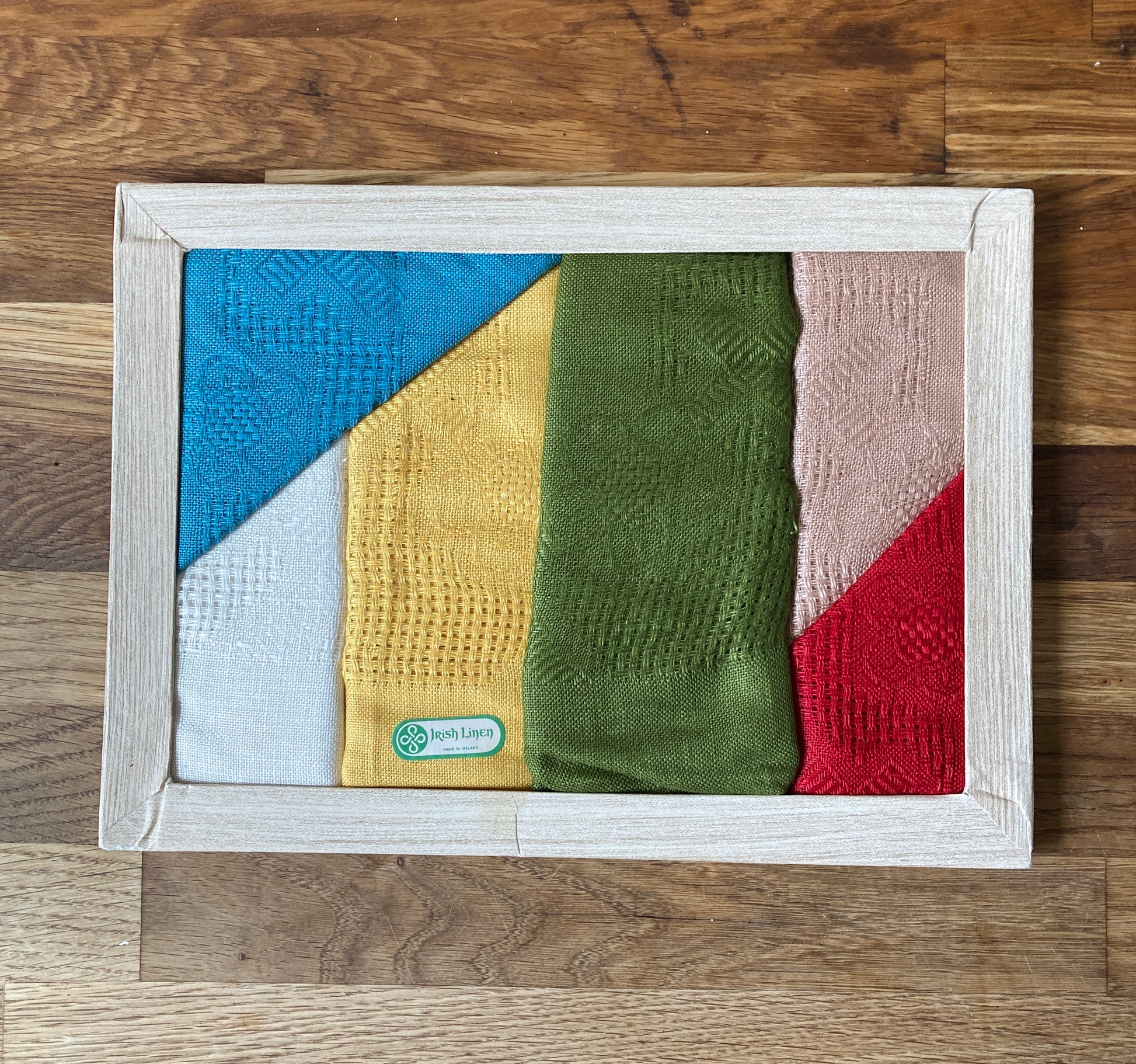A boxed set of multicoloured vintage linen napkins that I used to make a patchwork shirt