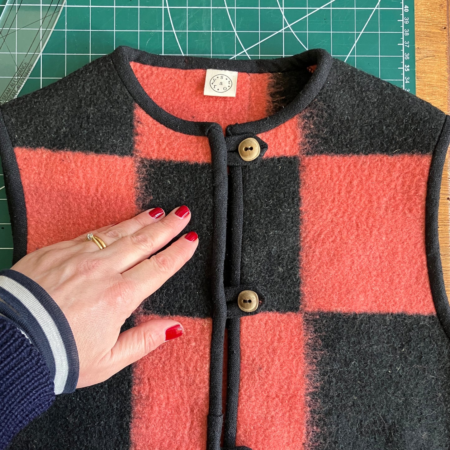 Cosy gilet/waistcoat/bodywarmer made from a fabulous pink and black checkerboard reclaimed wool blanket.