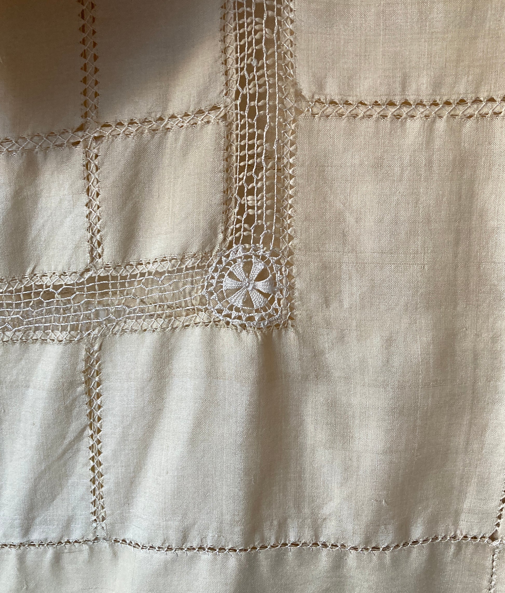 Sailor-collar shirt hand sewn from a reclaimed silk tablecloth, based on a vintage 80s pattern. Light and airy, cutwork detailing, fastens with found shell buttons (detail)