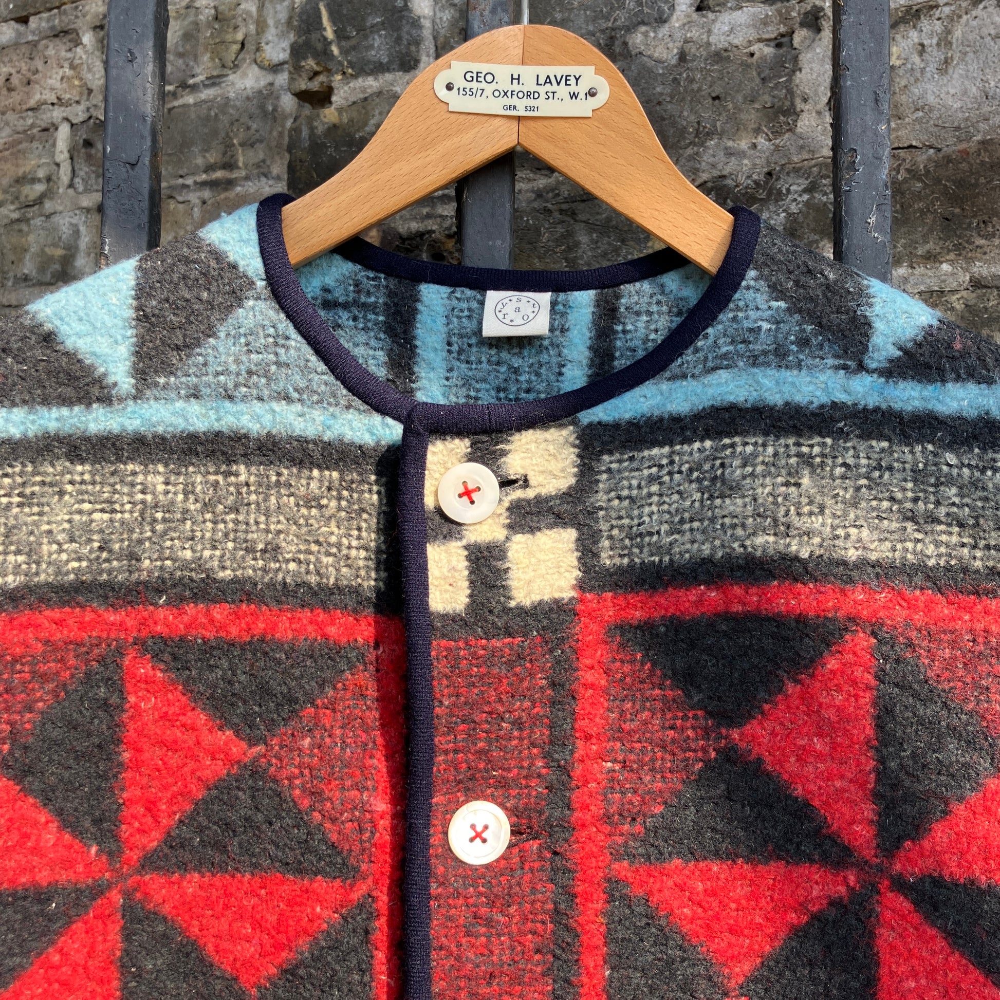 Cosy vest or waistcoat made from a reclaimed vintage patchwork-effect blanket.