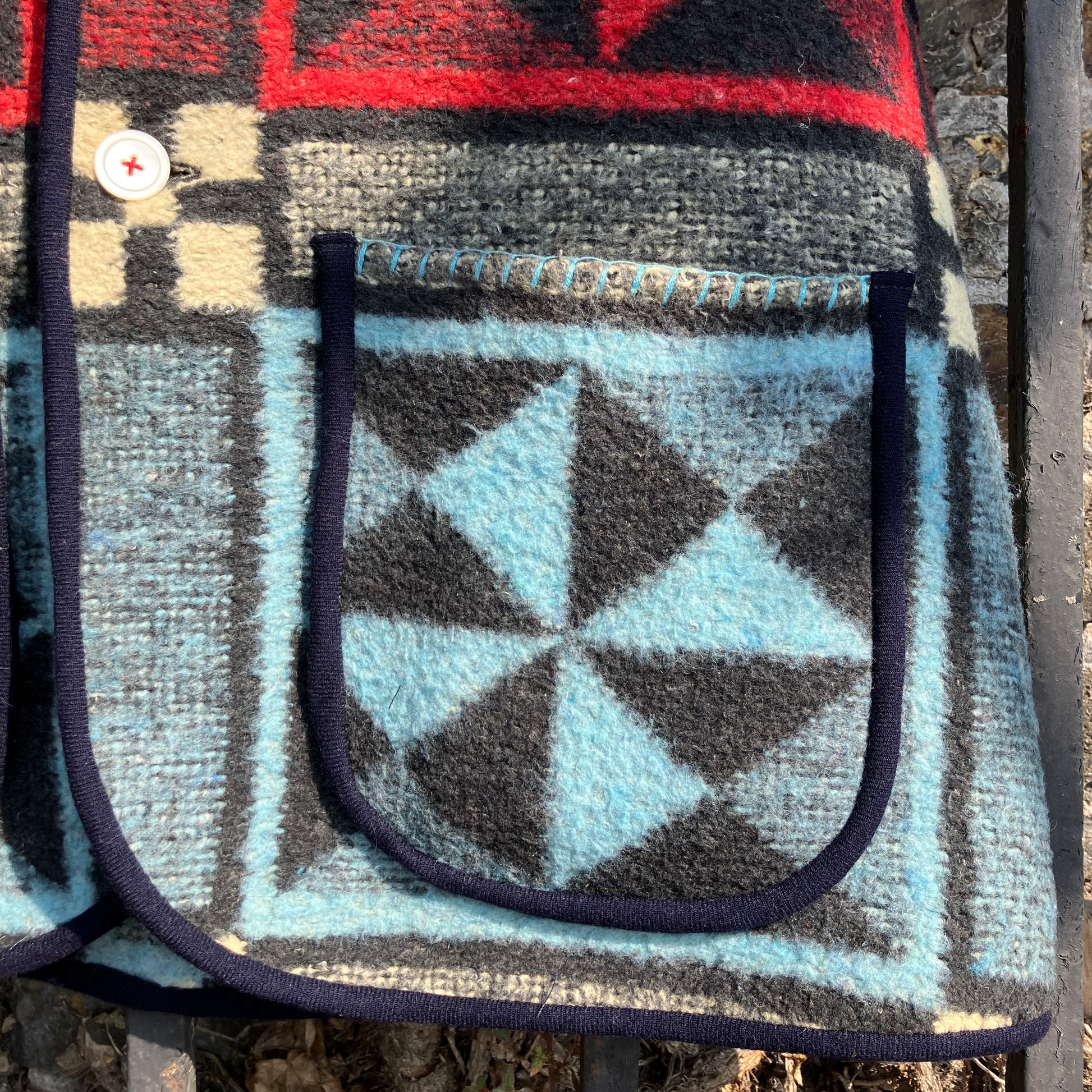 Cosy vest or waistcoat made from a reclaimed vintage patchwork-effect blanket.