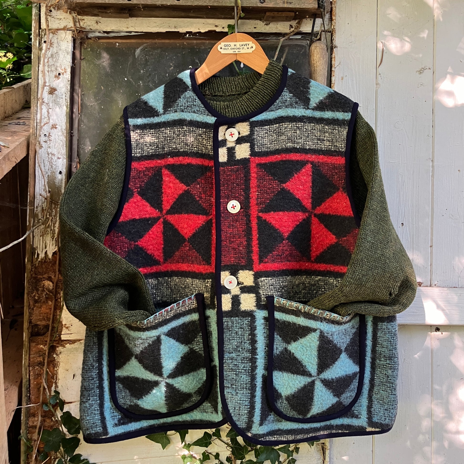 Cosy vest or waistcoat made from a reclaimed vintage patchwork-effect blanket.