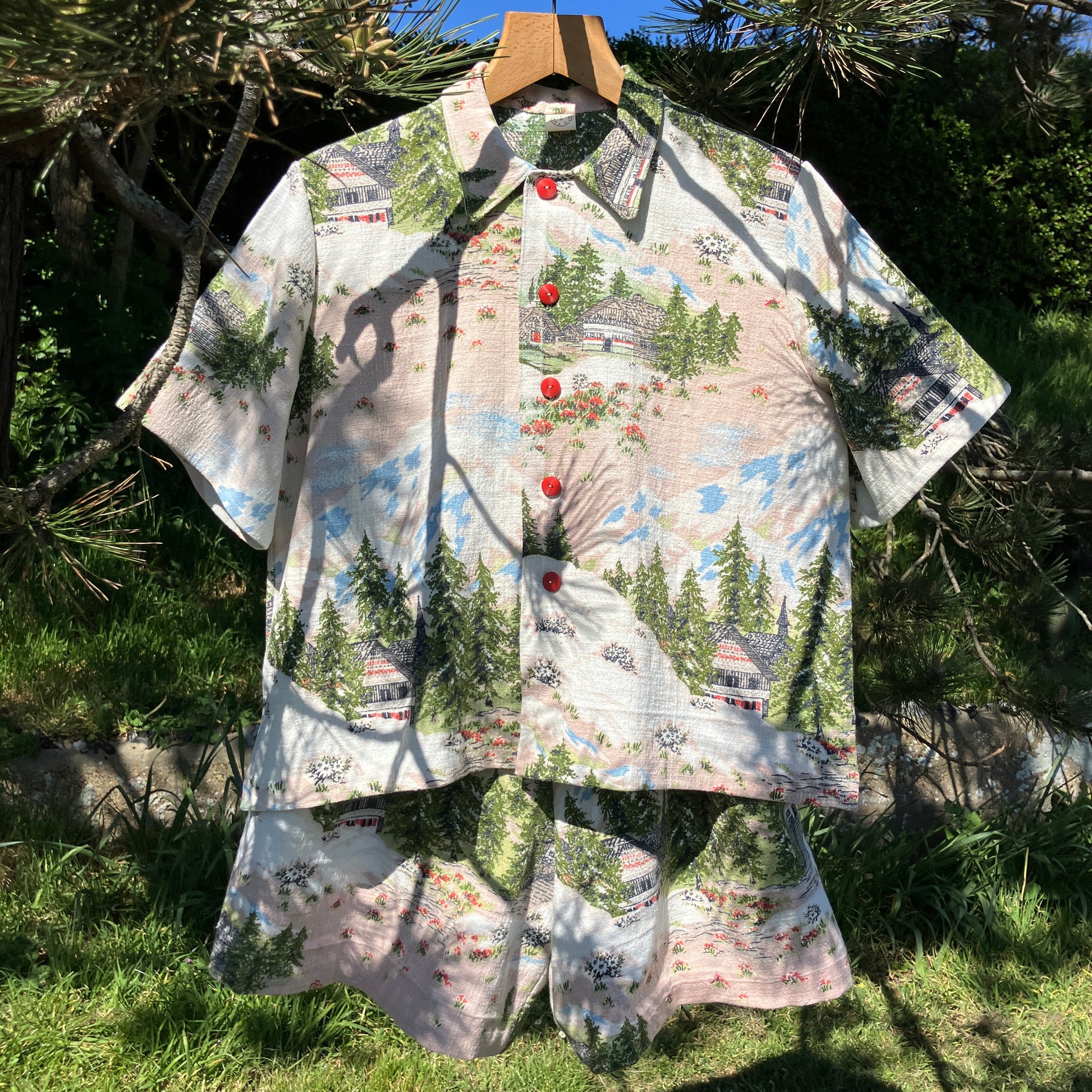 Shirt and shorts set made from a reclaimed vintage Alpine-scenes curtain