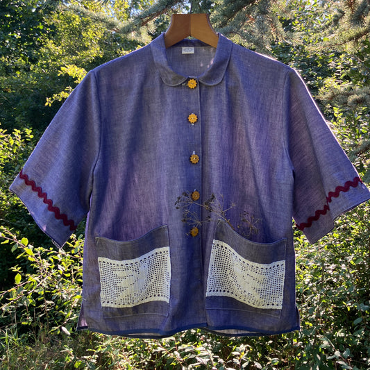 Reclaimed blue chambray shirt with star shaped buttons, birds on the pockets and ric-rac round the sleeves