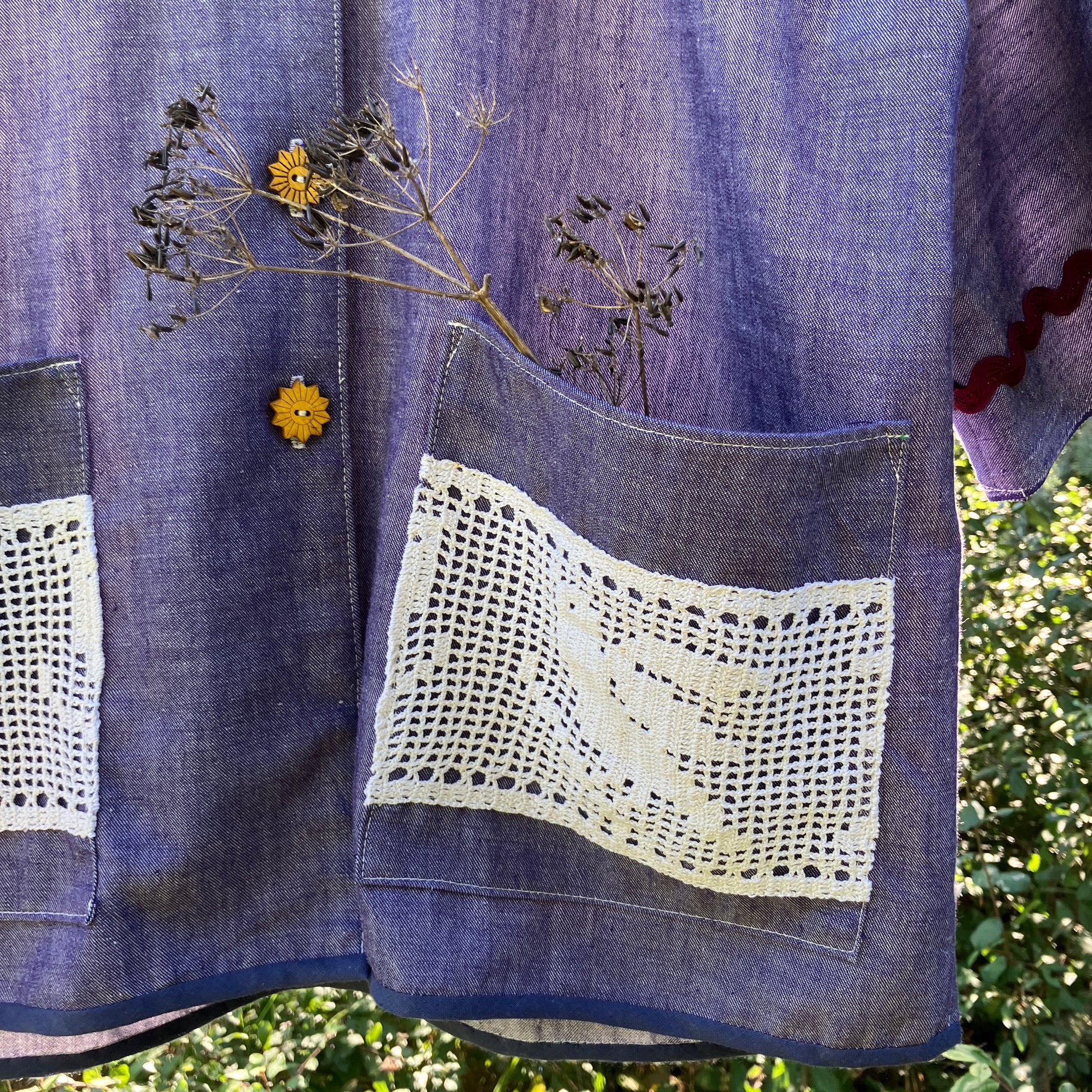 Reclaimed blue chambray shirt with star shaped buttons, birds on the pockets and ric-rac round the sleeves