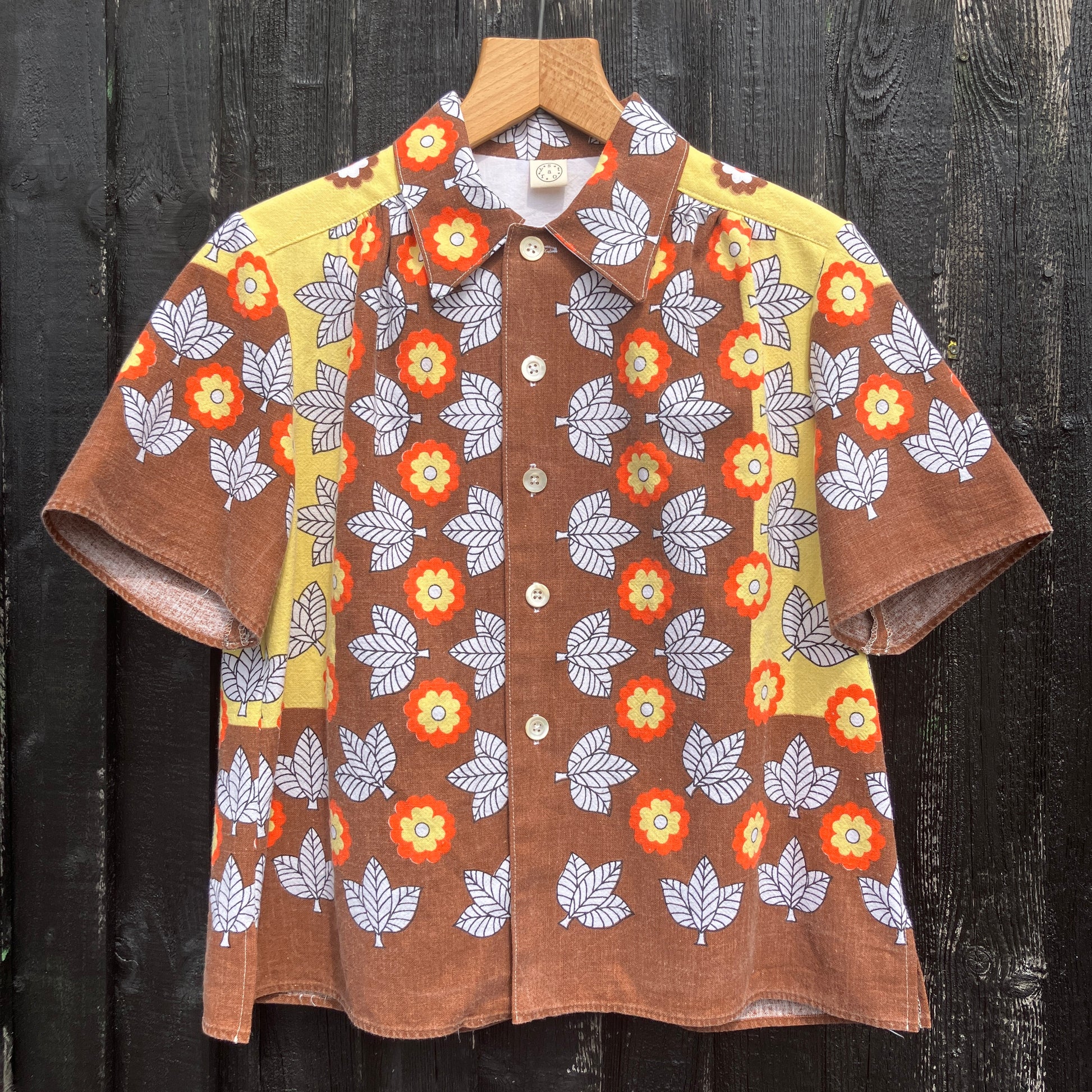 Shirt made from a brown, orange and yellow 70s vintage tablecloth