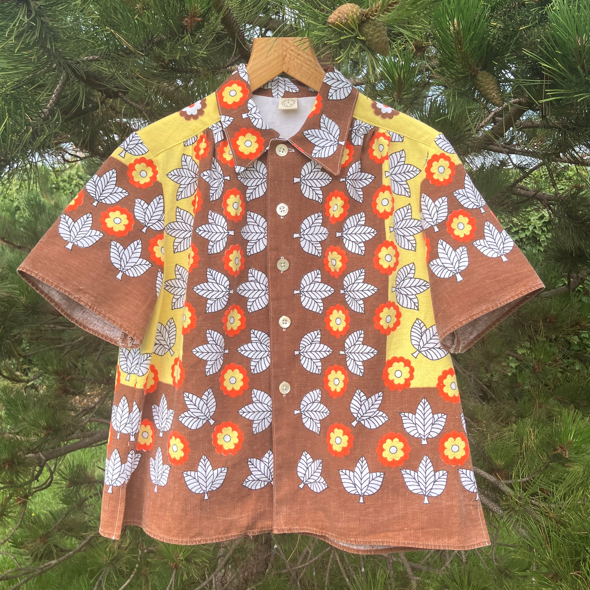 Shirt made from a brown, orange and yellow 70s vintage tablecloth
