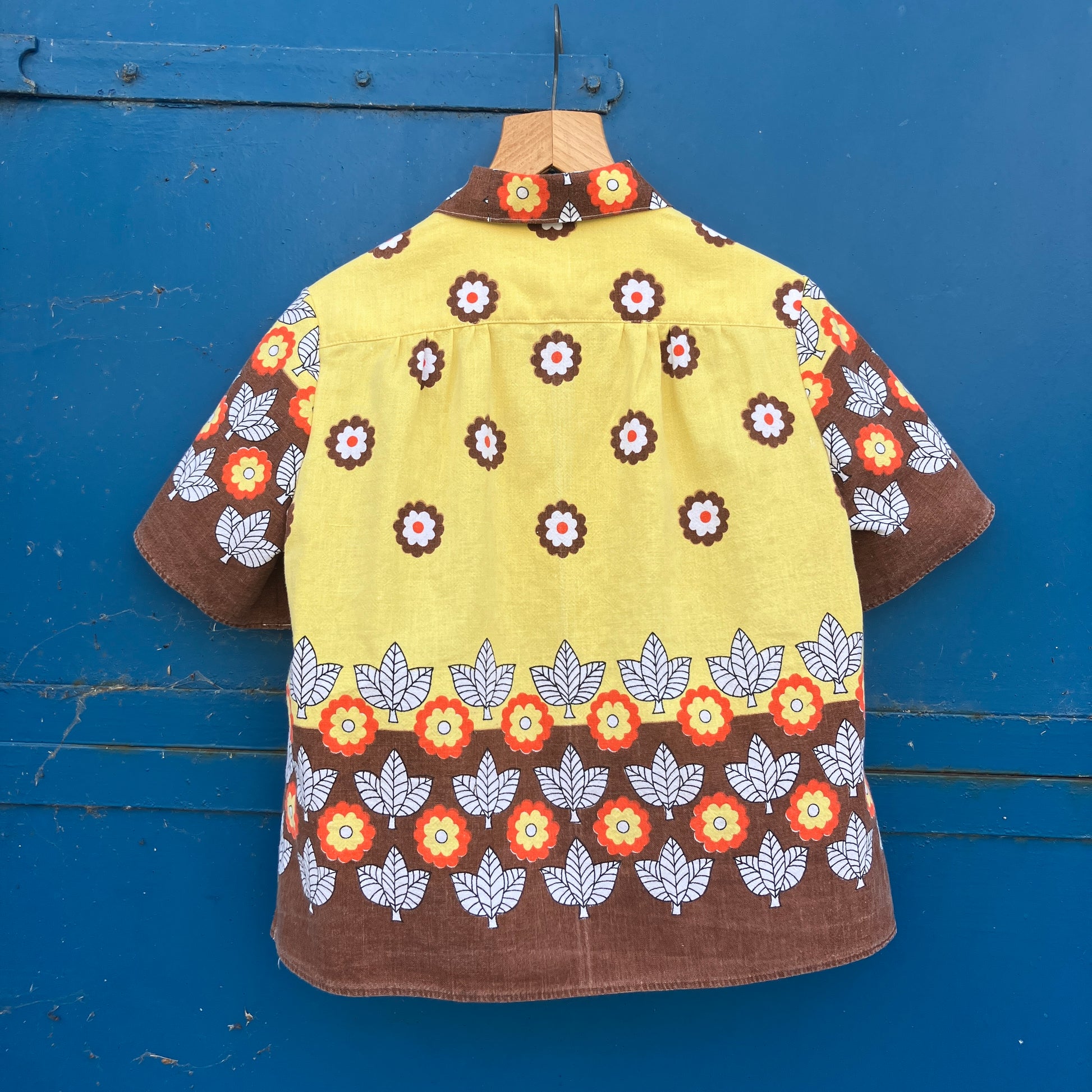 Shirt made from a brown, orange and yellow 70s vintage tablecloth