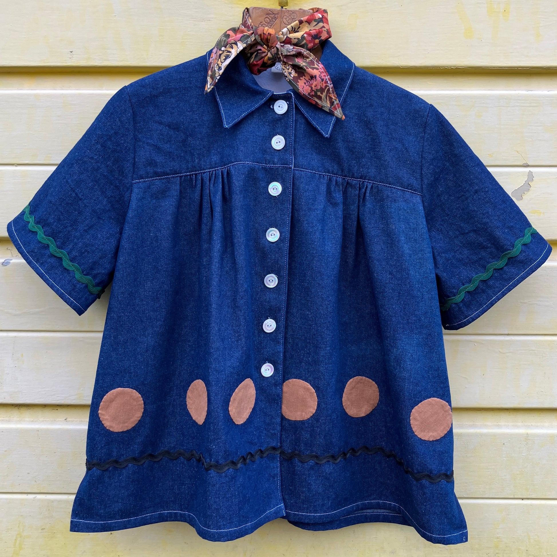 Shirt made from reclaimed denim with appliqué details and ric-rac