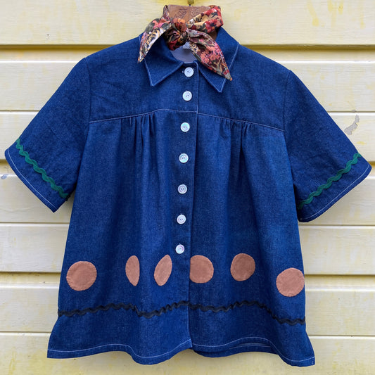 Shirt made from reclaimed denim with appliqué details and ric-rac