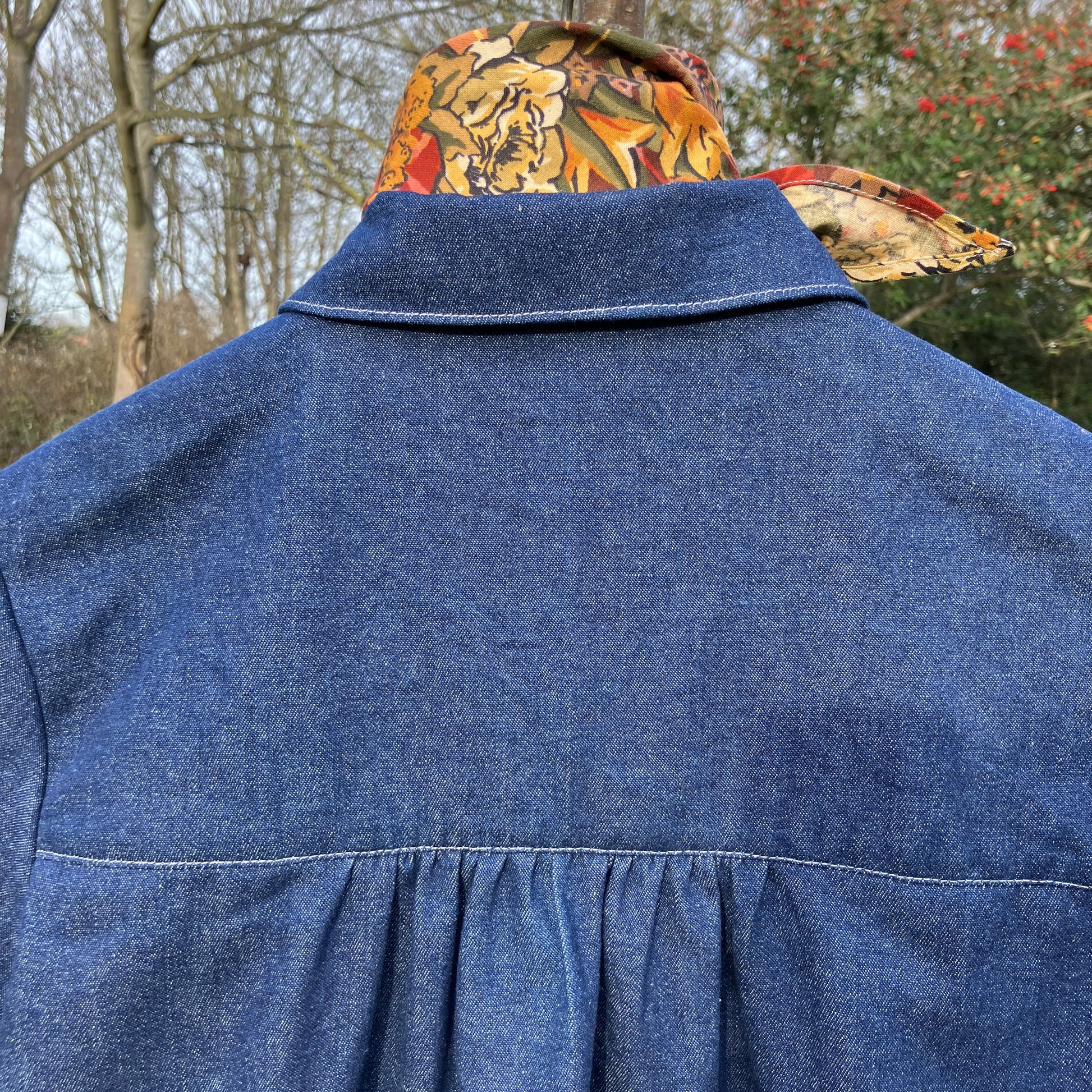 Shirt made from reclaimed denim with appliqué details and ric-rac