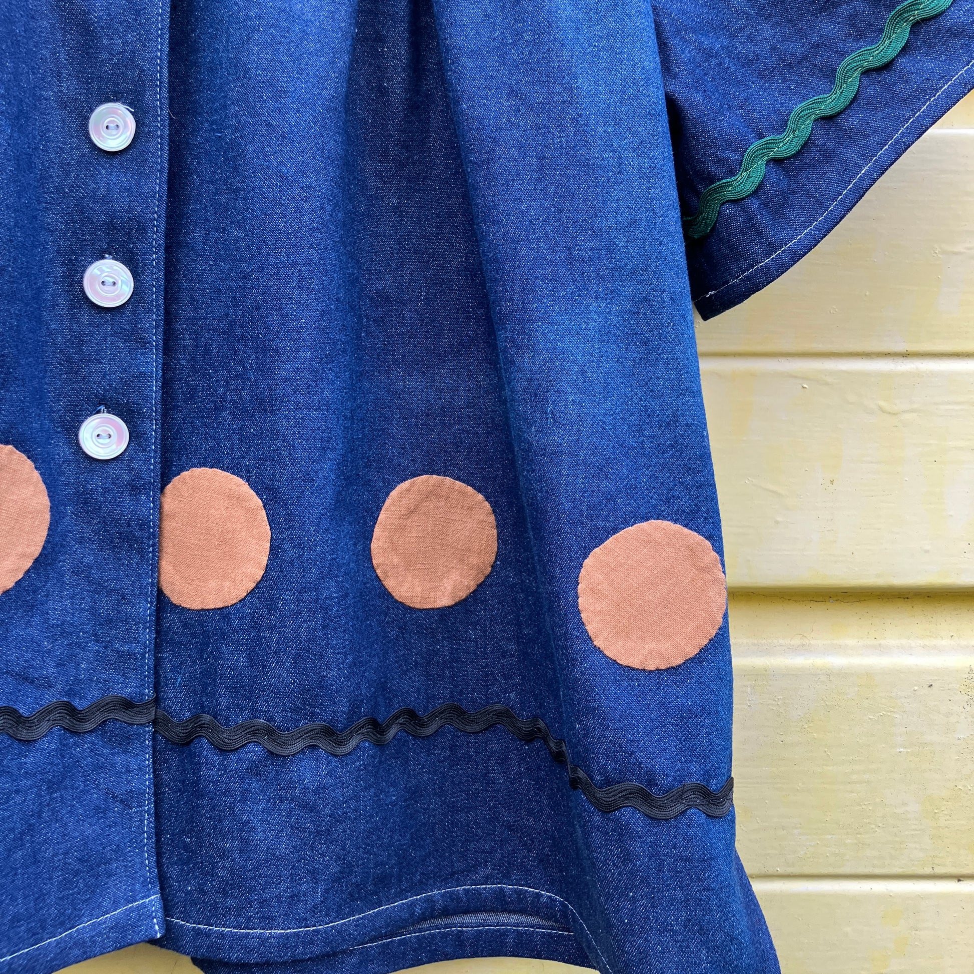 Shirt made from reclaimed denim with appliqué details and ric-rac