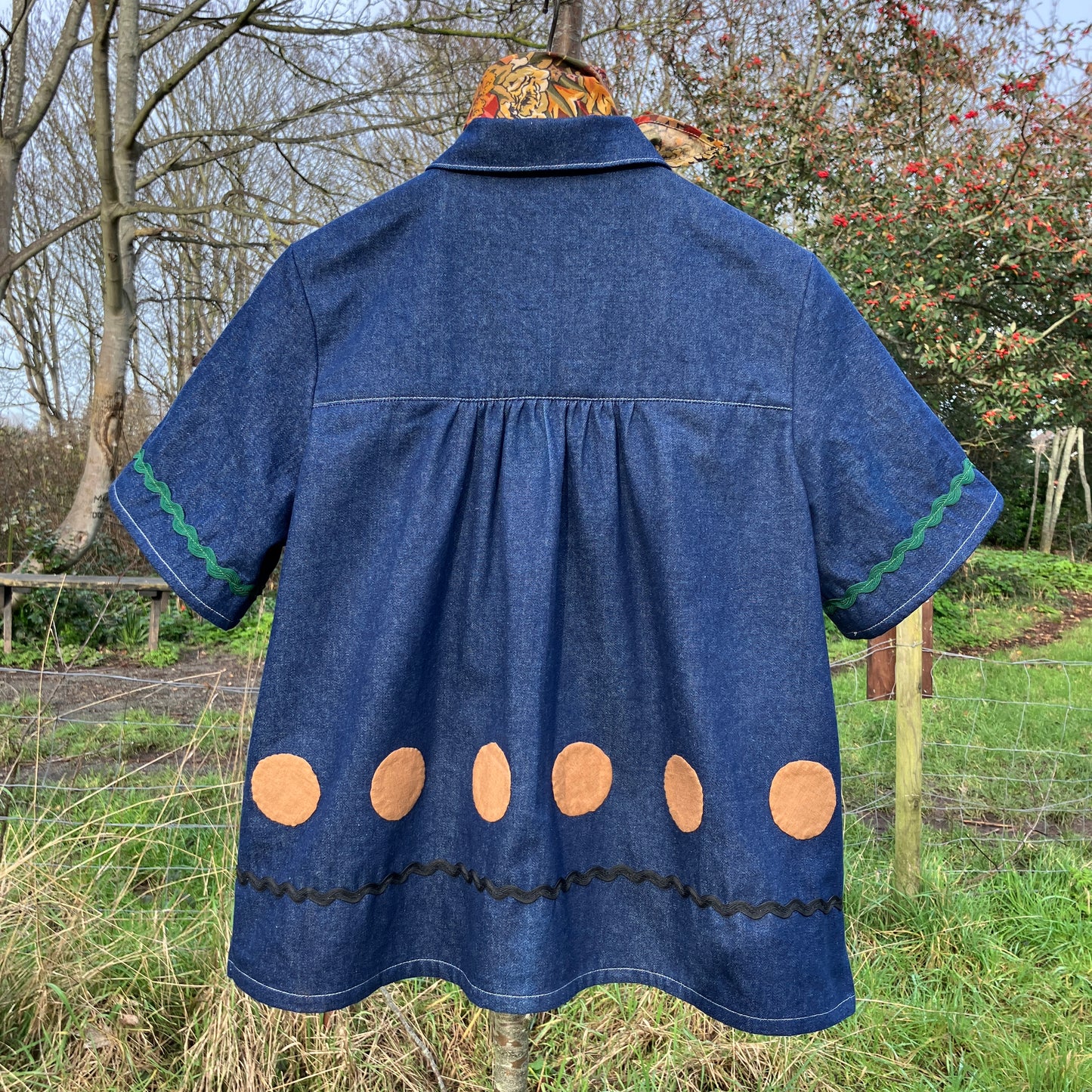 Shirt made from reclaimed denim with appliqué details and ric-rac
