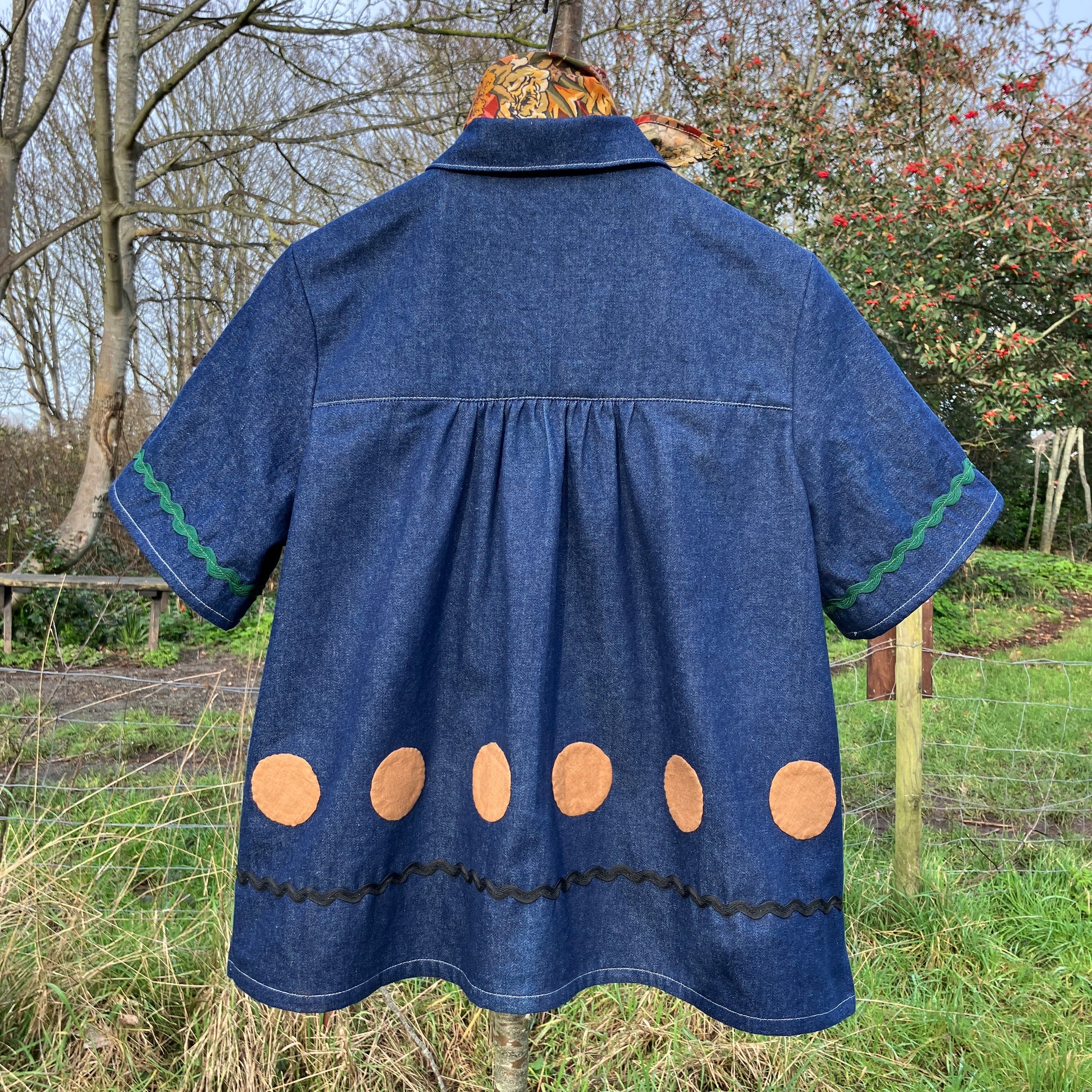Shirt made from reclaimed denim with appliqué details and ric-rac