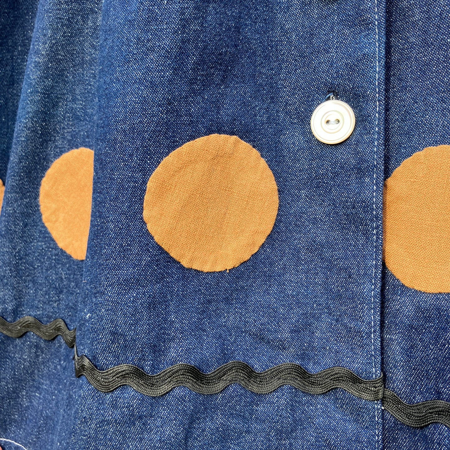 Shirt made from reclaimed denim with appliqué details and ric-rac