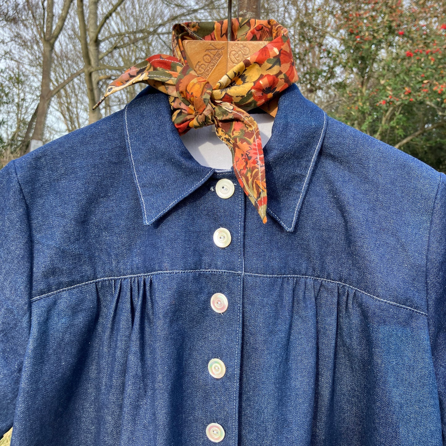 Shirt made from reclaimed denim with appliqué details and ric-rac
