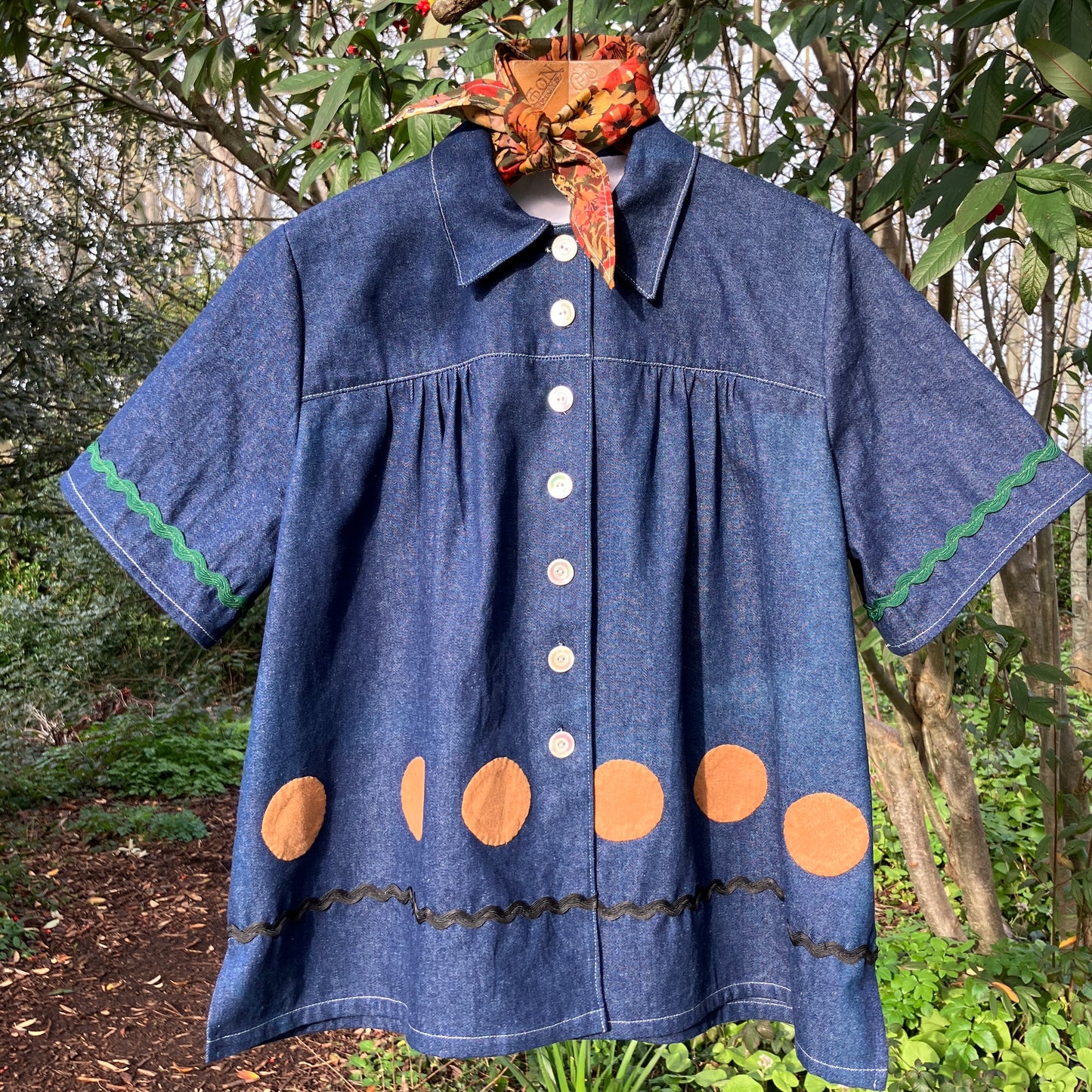 Shirt made from reclaimed denim with appliqué details and ric-rac
