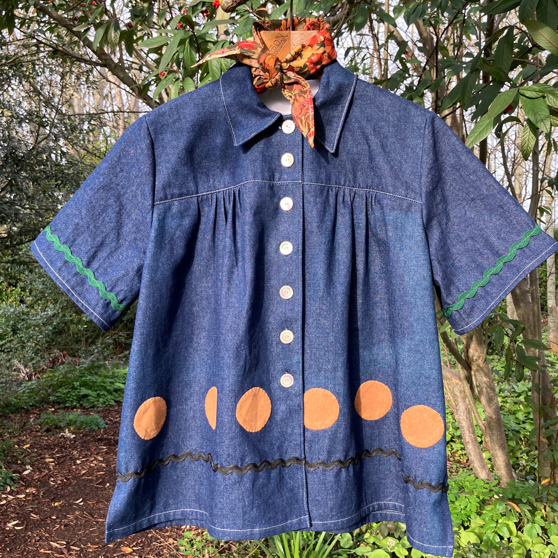 Shirt made from reclaimed denim with appliqué details and ric-rac