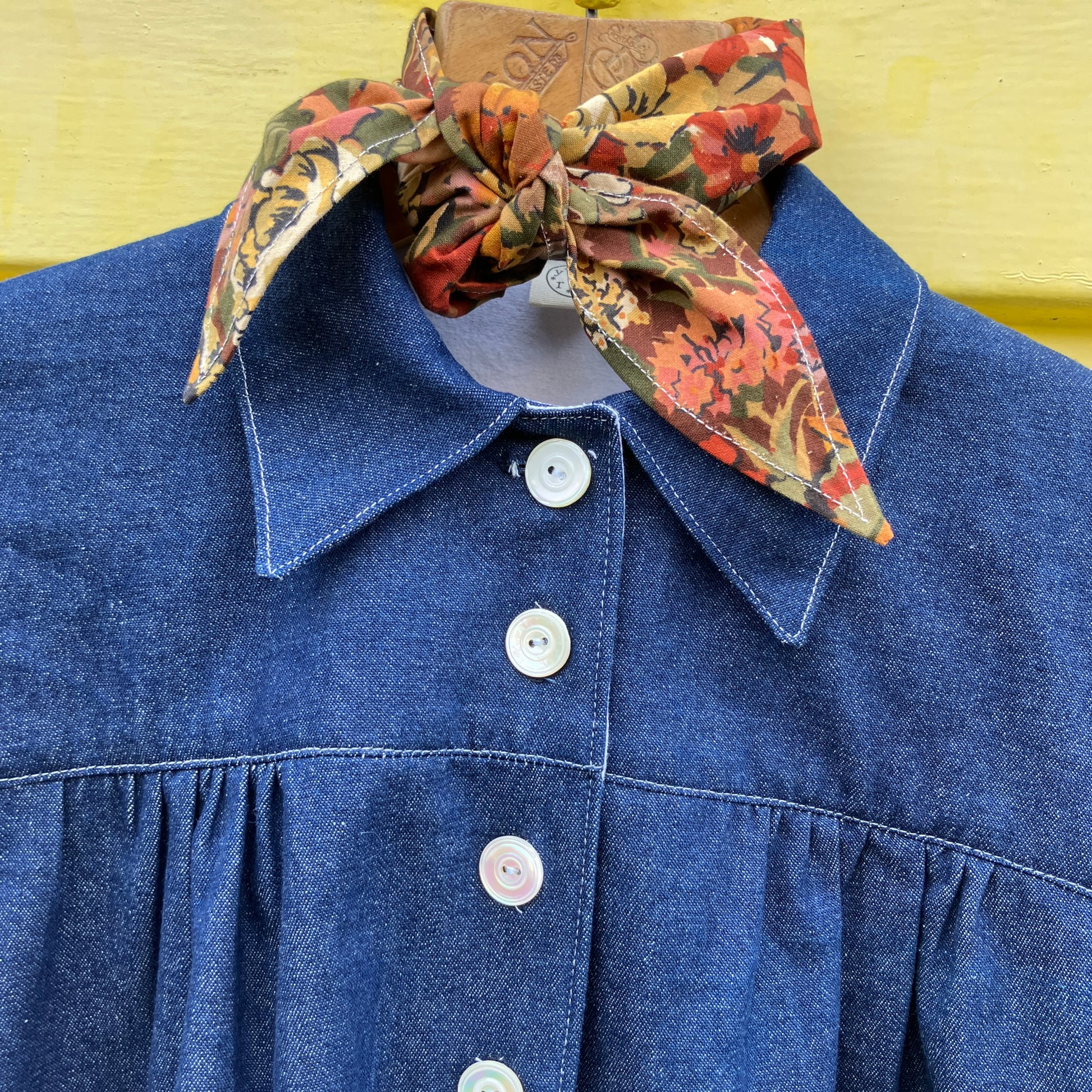 Shirt made from reclaimed denim with appliqué details and ric-rac