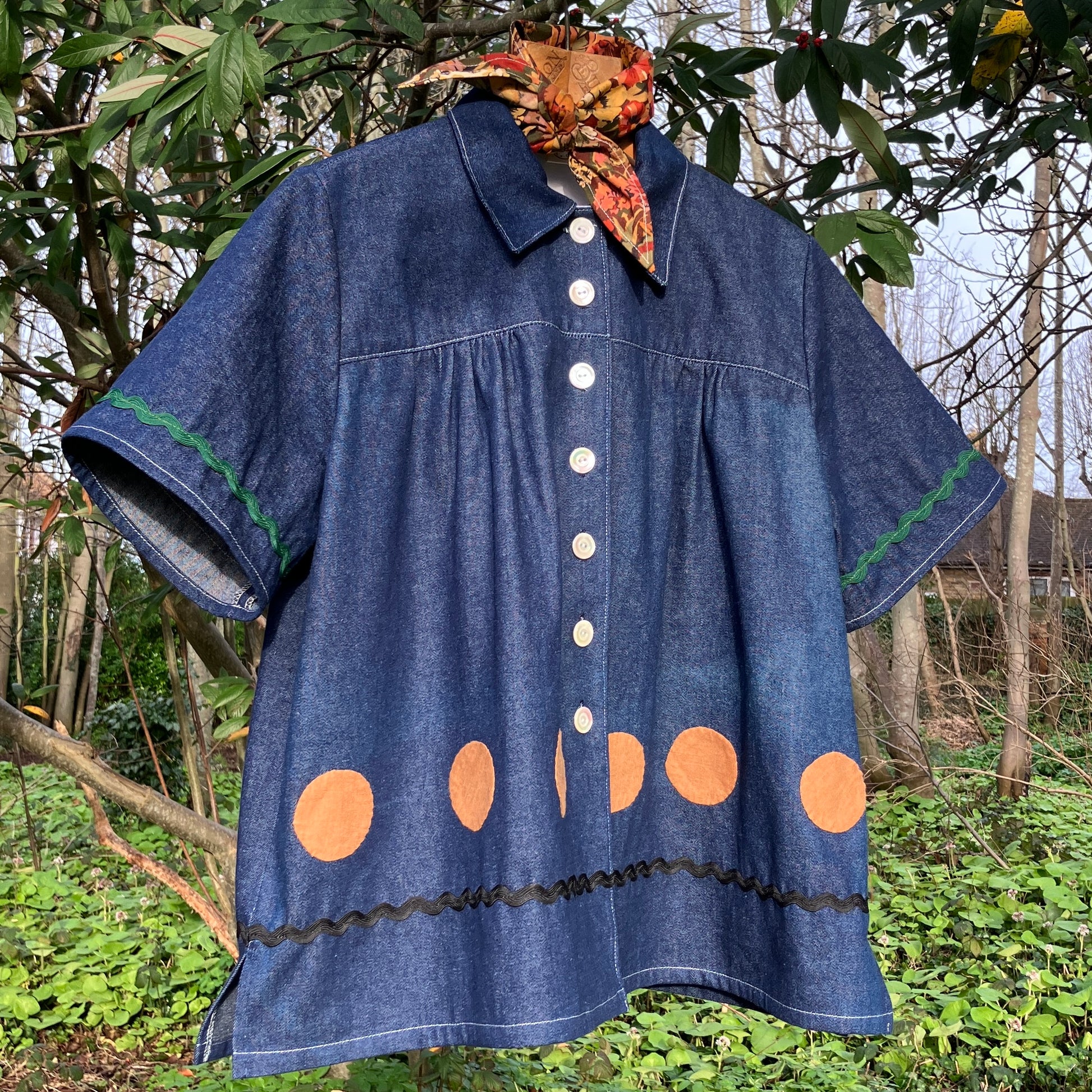 Shirt made from reclaimed denim with appliqué details and ric-rac