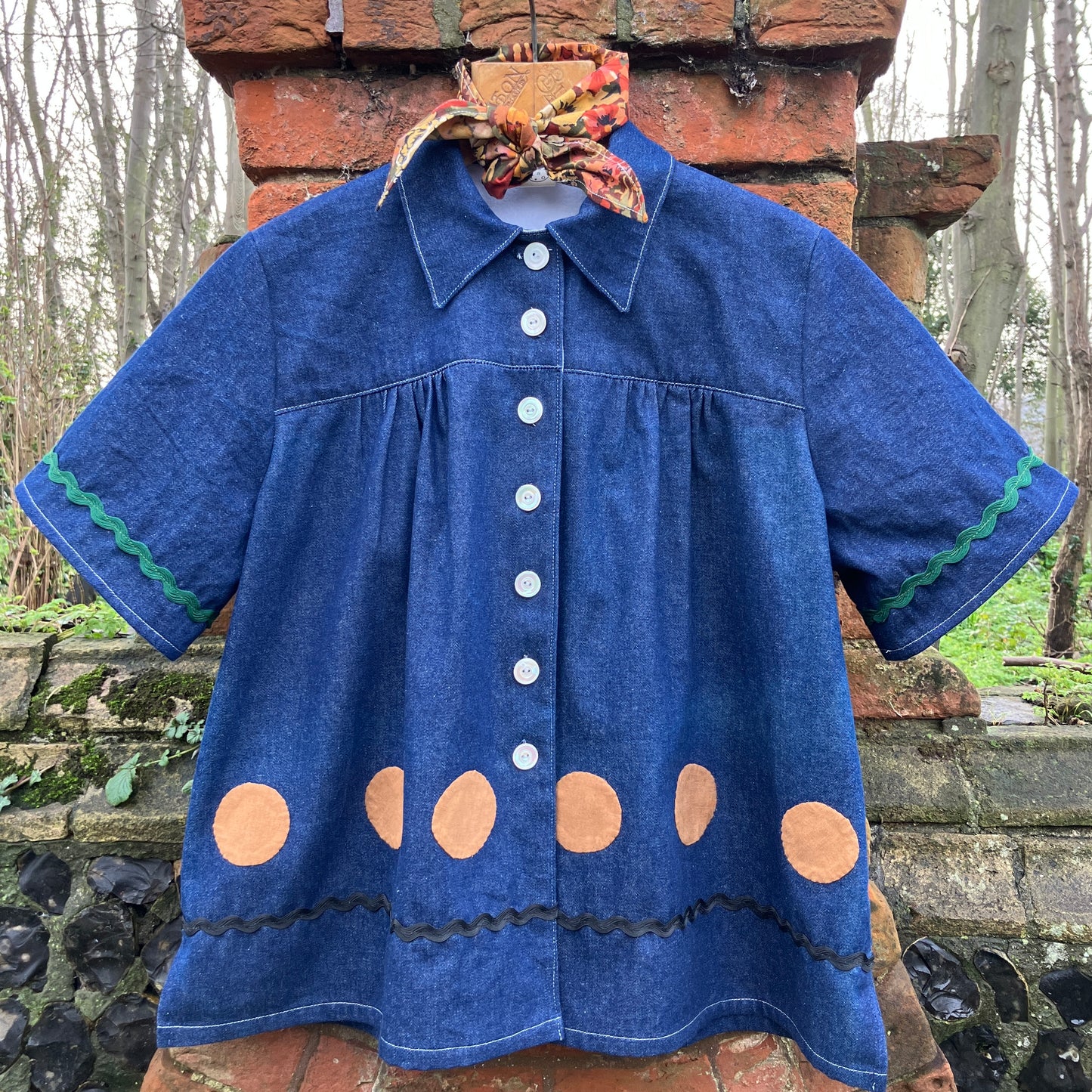 Shirt made from reclaimed denim with appliqué details and ric-rac