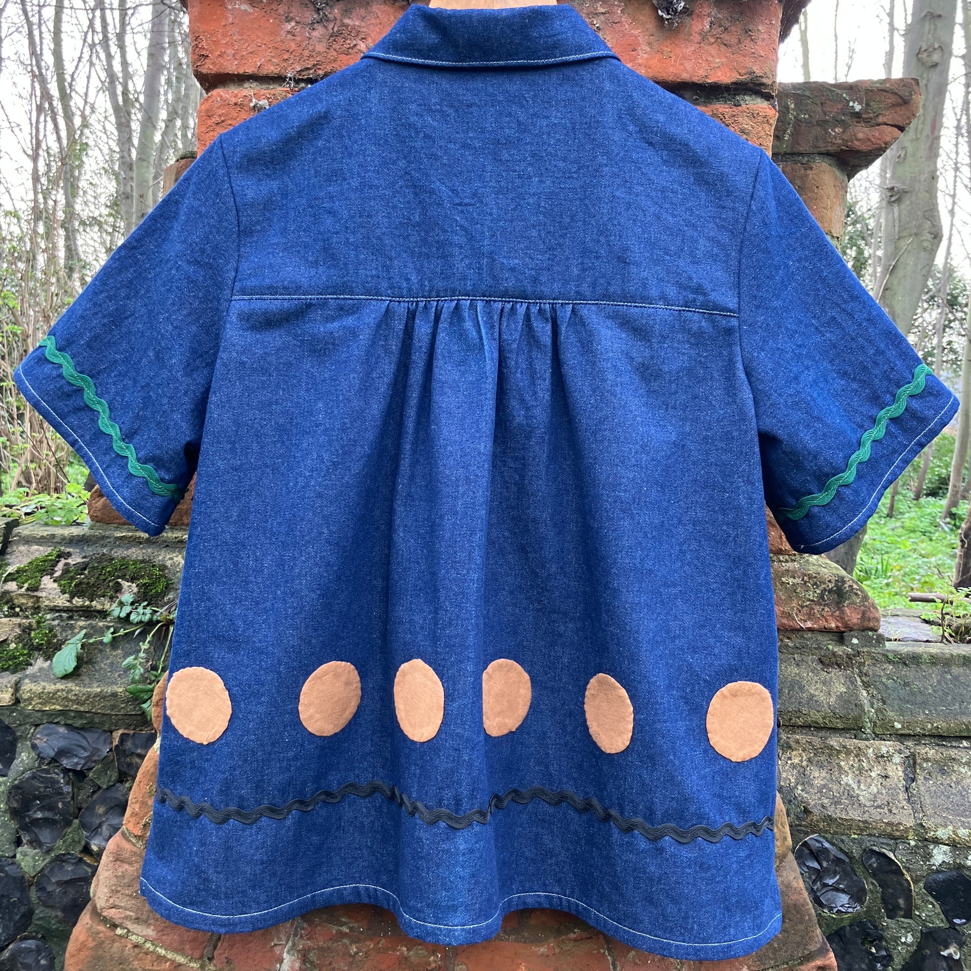 Shirt made from reclaimed denim with appliqué details and ric-rac