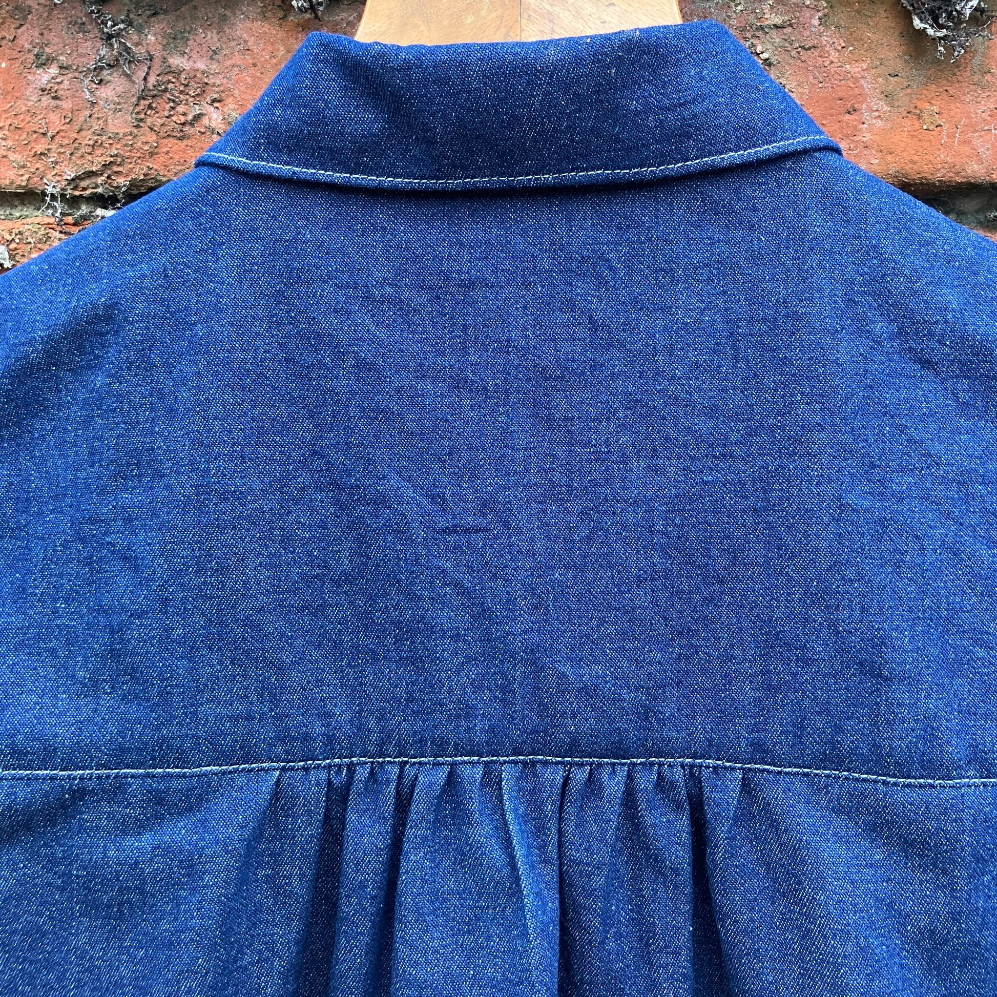 Shirt made from reclaimed denim with appliqué details and ric-rac