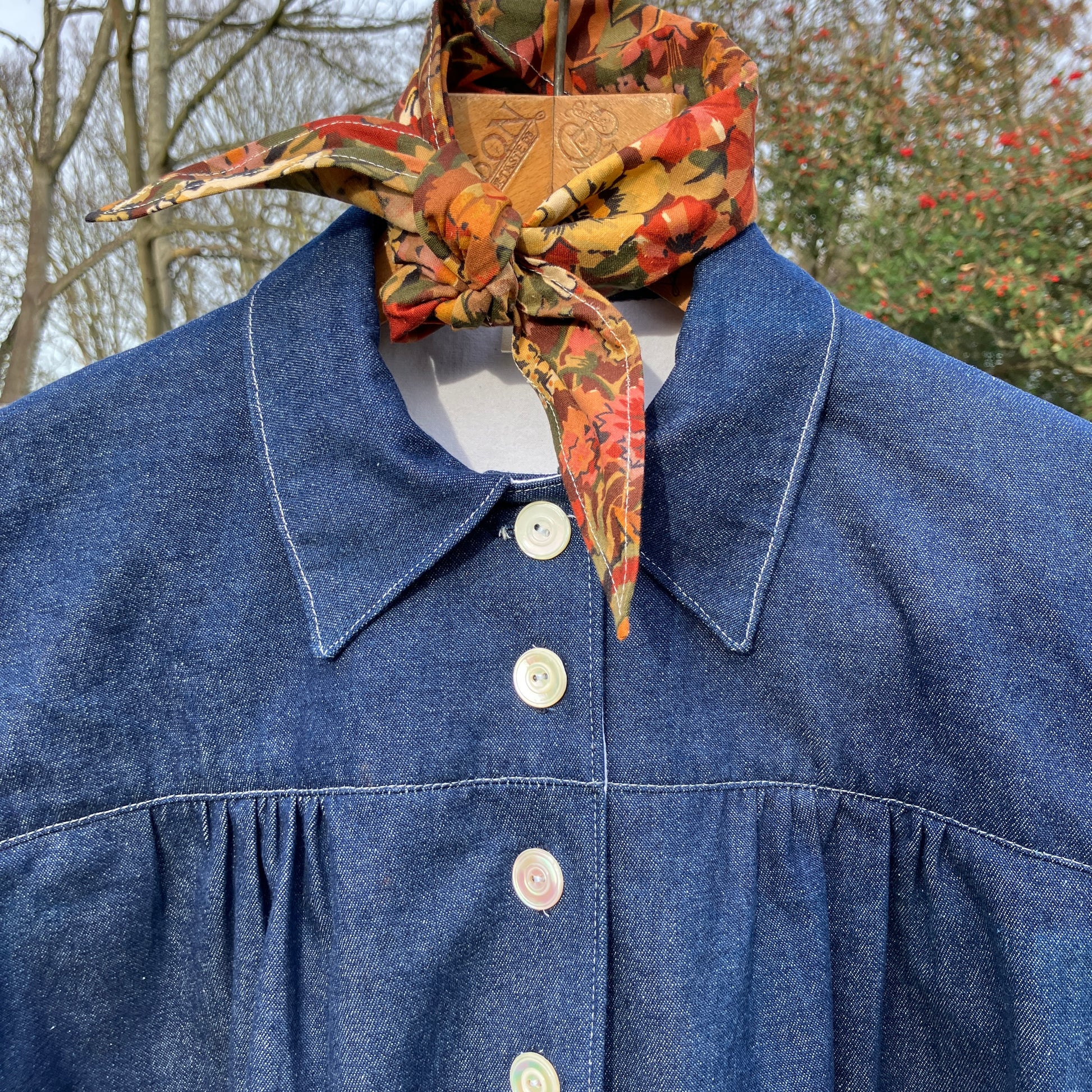 Shirt made from reclaimed denim with appliqué details and ric-rac