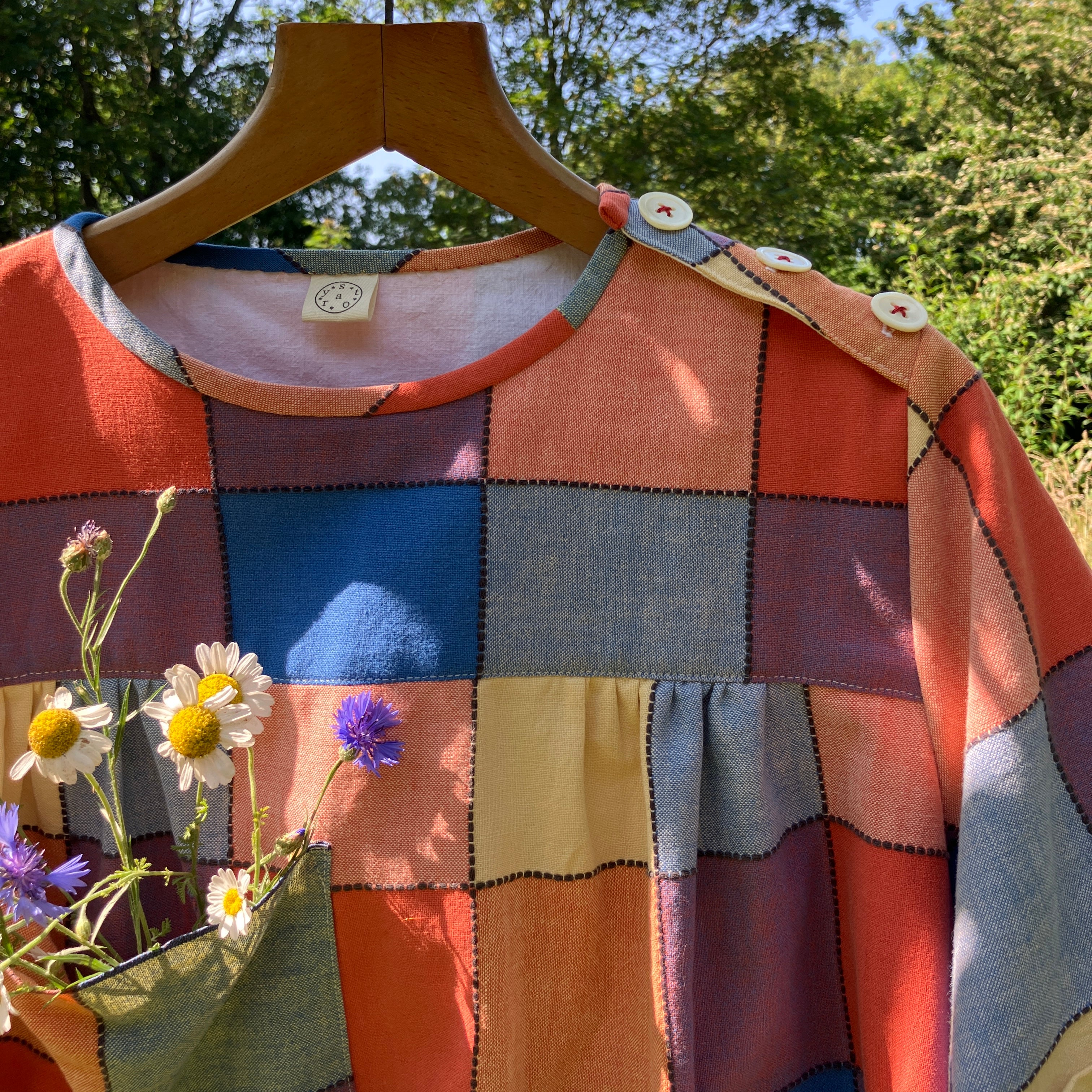 Reclaimed tablecloth side-button smock top – a circular story
