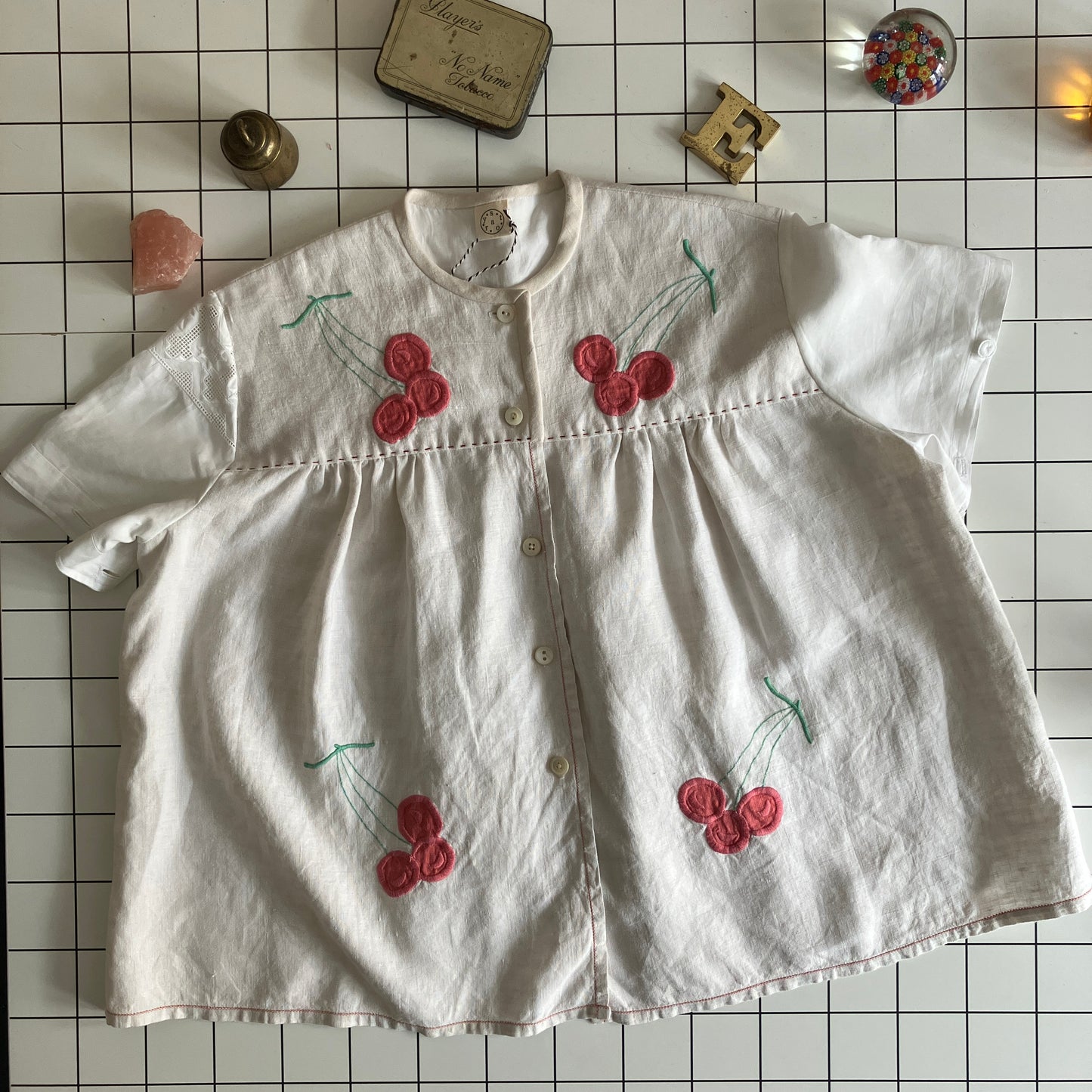 Top made from a patchwork of a recycled linen tablecloth with cherry motifs and antique bed linen