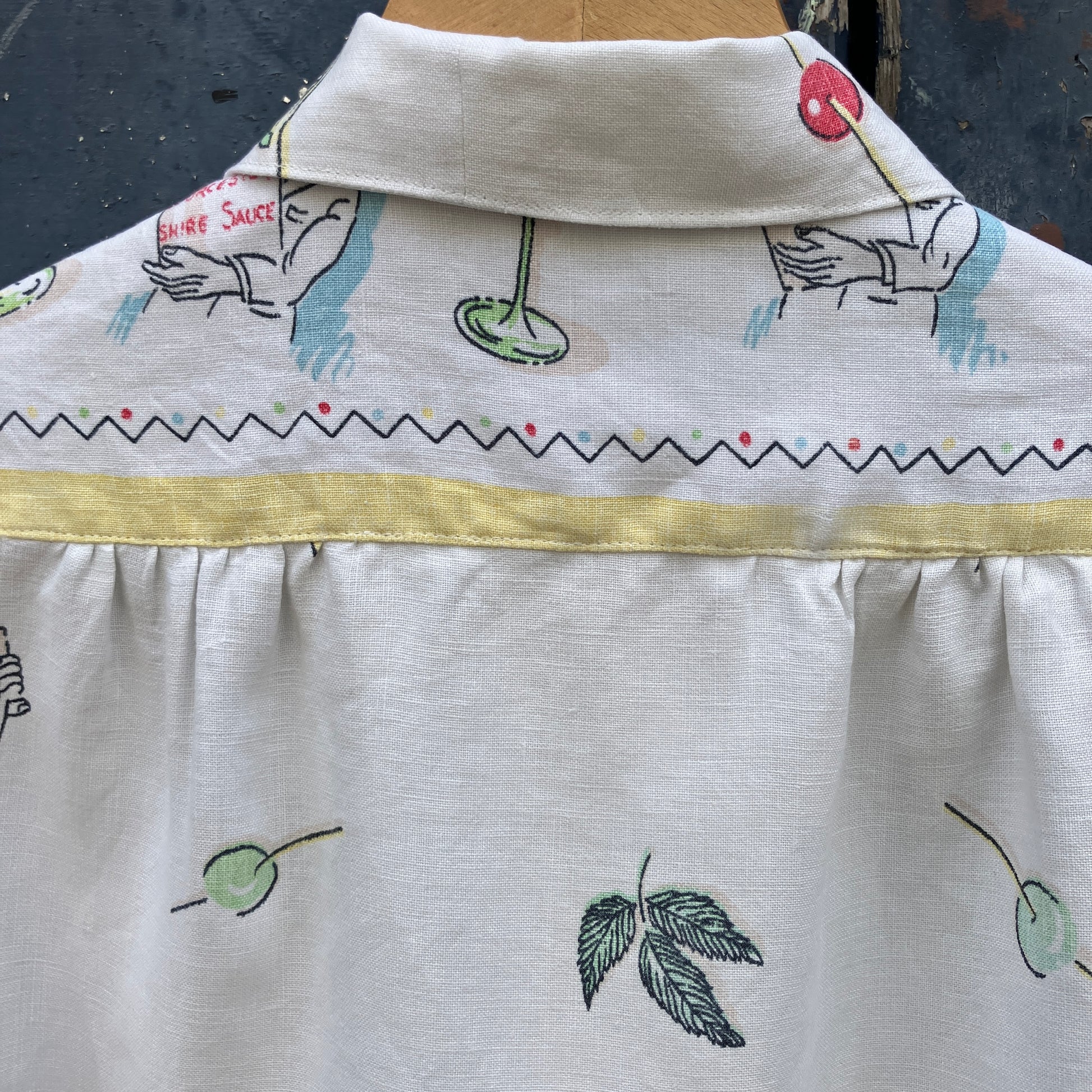 shirt made from a recycled vintage linen tablecloth with a cocktails theme