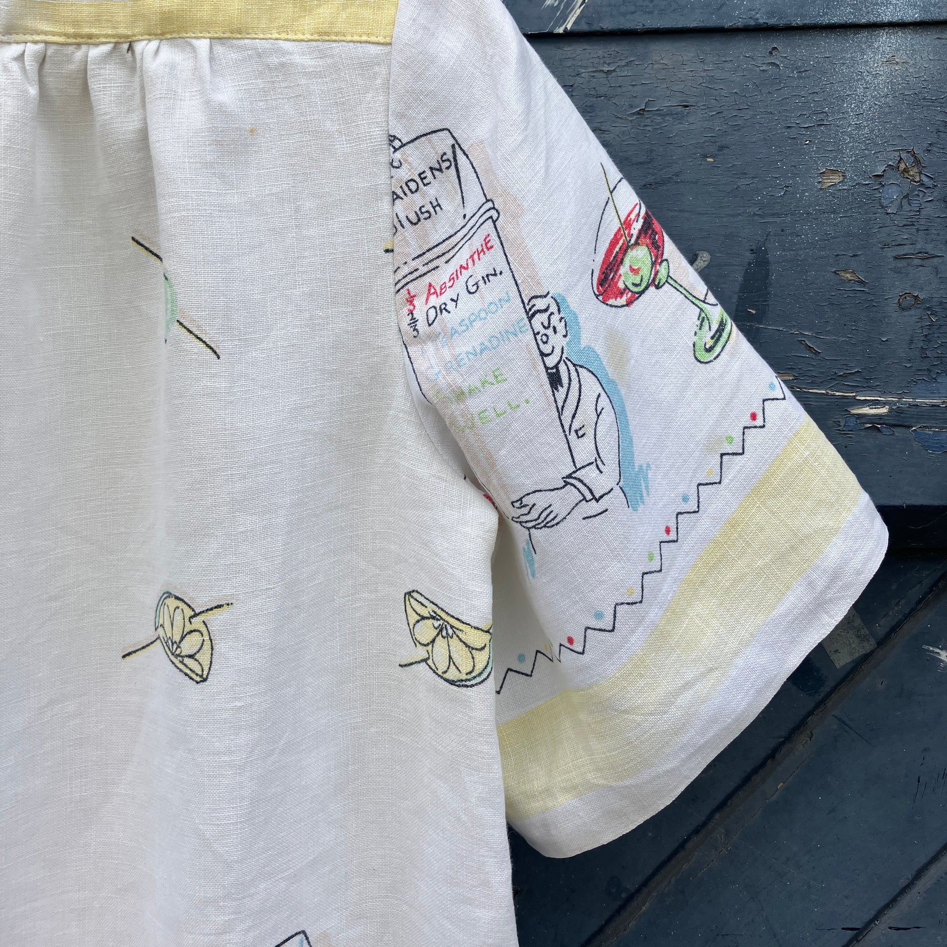 shirt made from a recycled vintage linen tablecloth with a cocktails theme