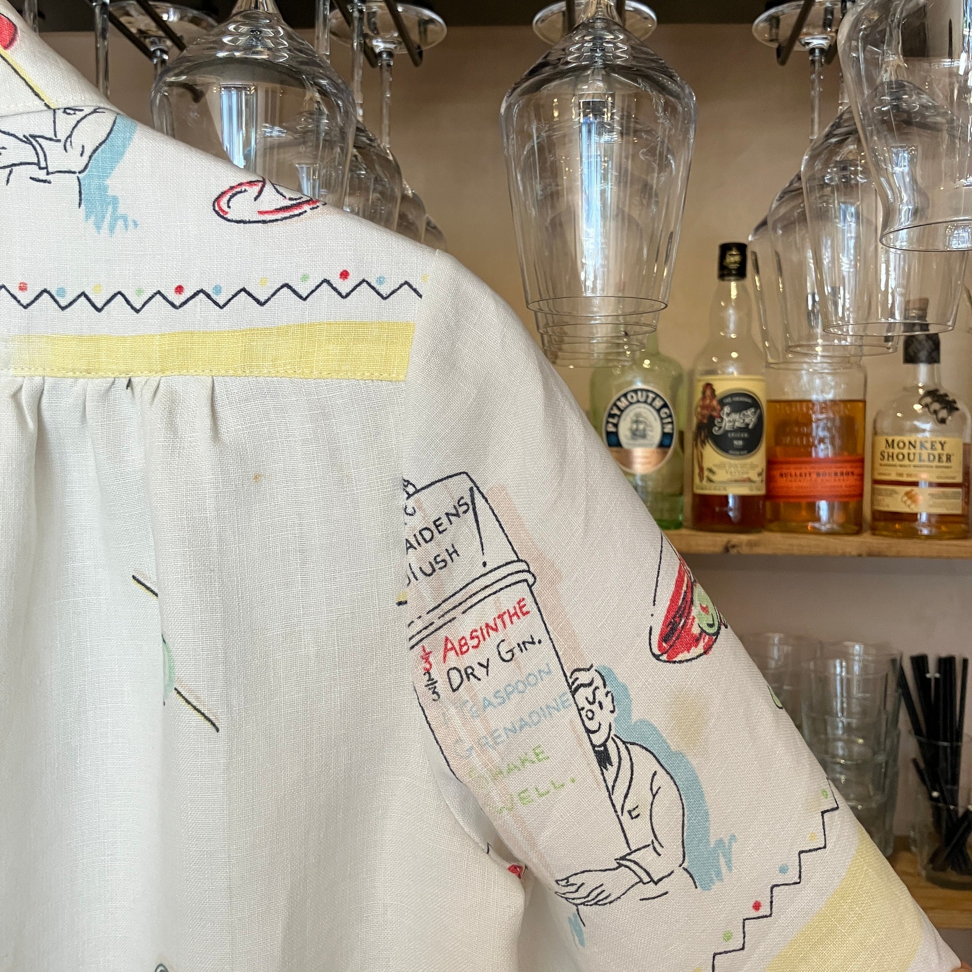 shirt made from a recycled vintage linen tablecloth with a cocktails theme