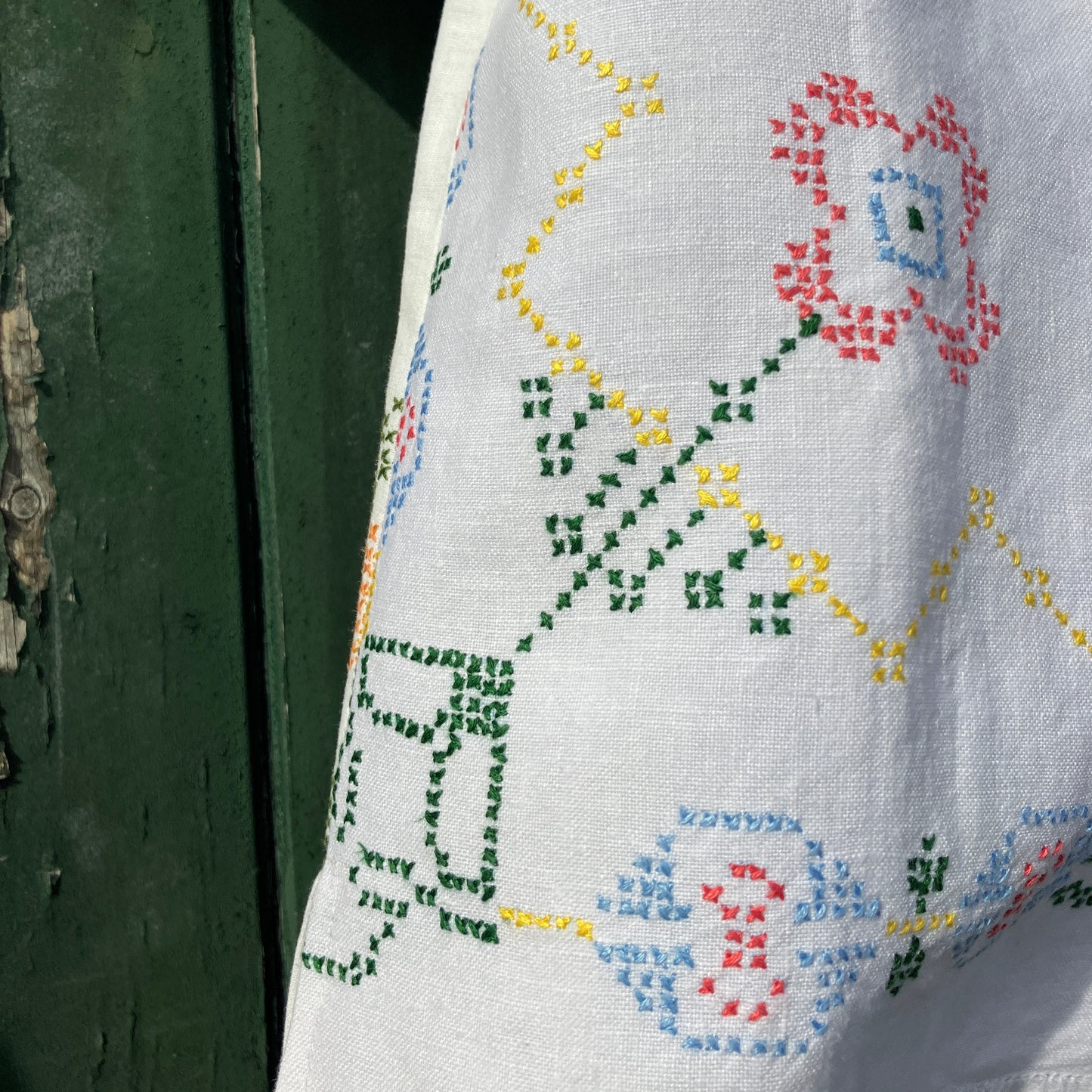 Recycled cross-stitch tablecloth shirt