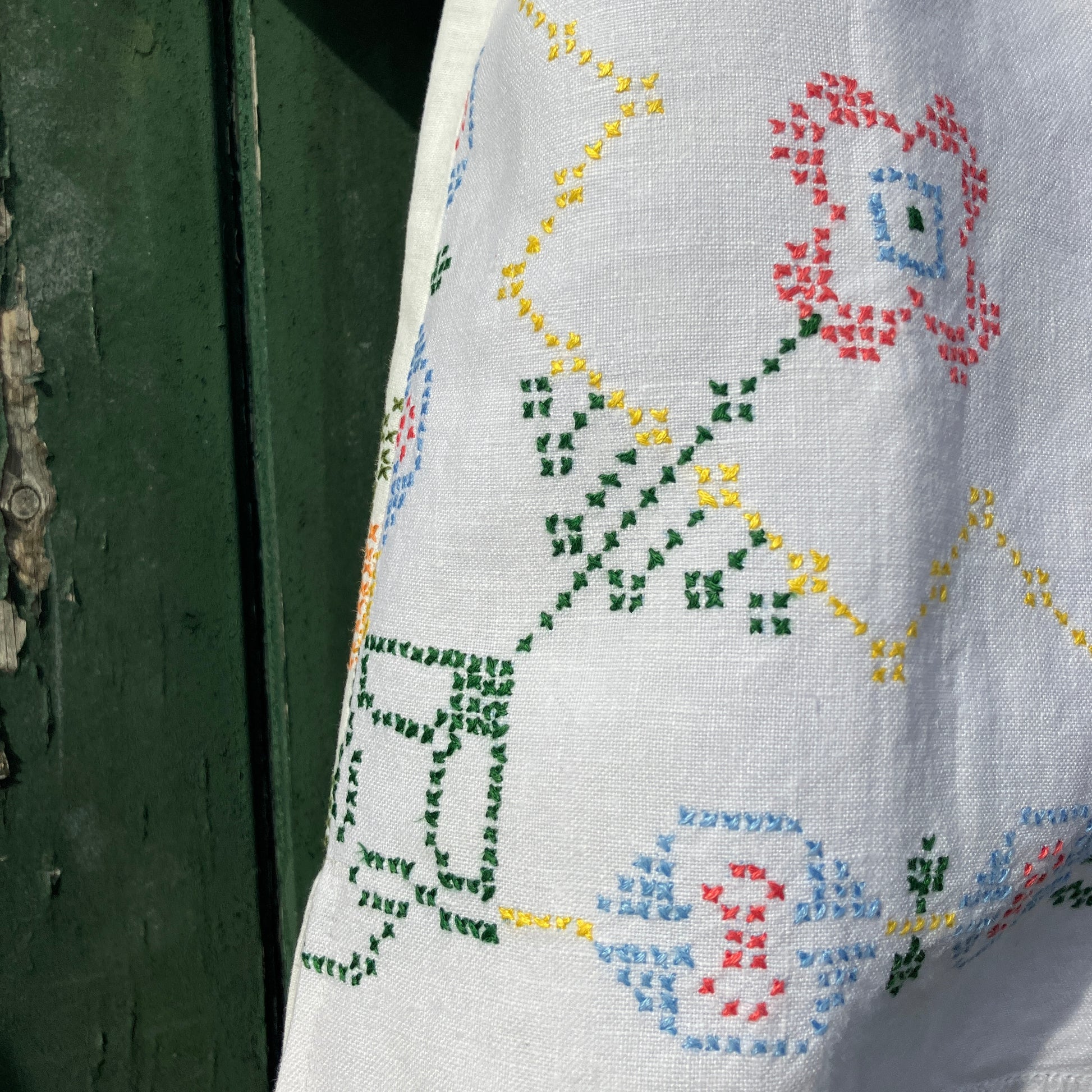 Recycled cross-stitch tablecloth shirt