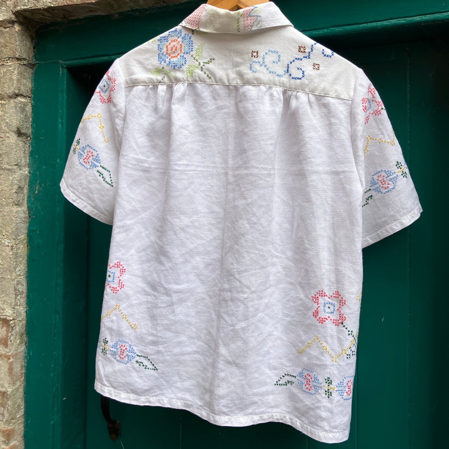 Recycled cross-stitch tablecloth shirt