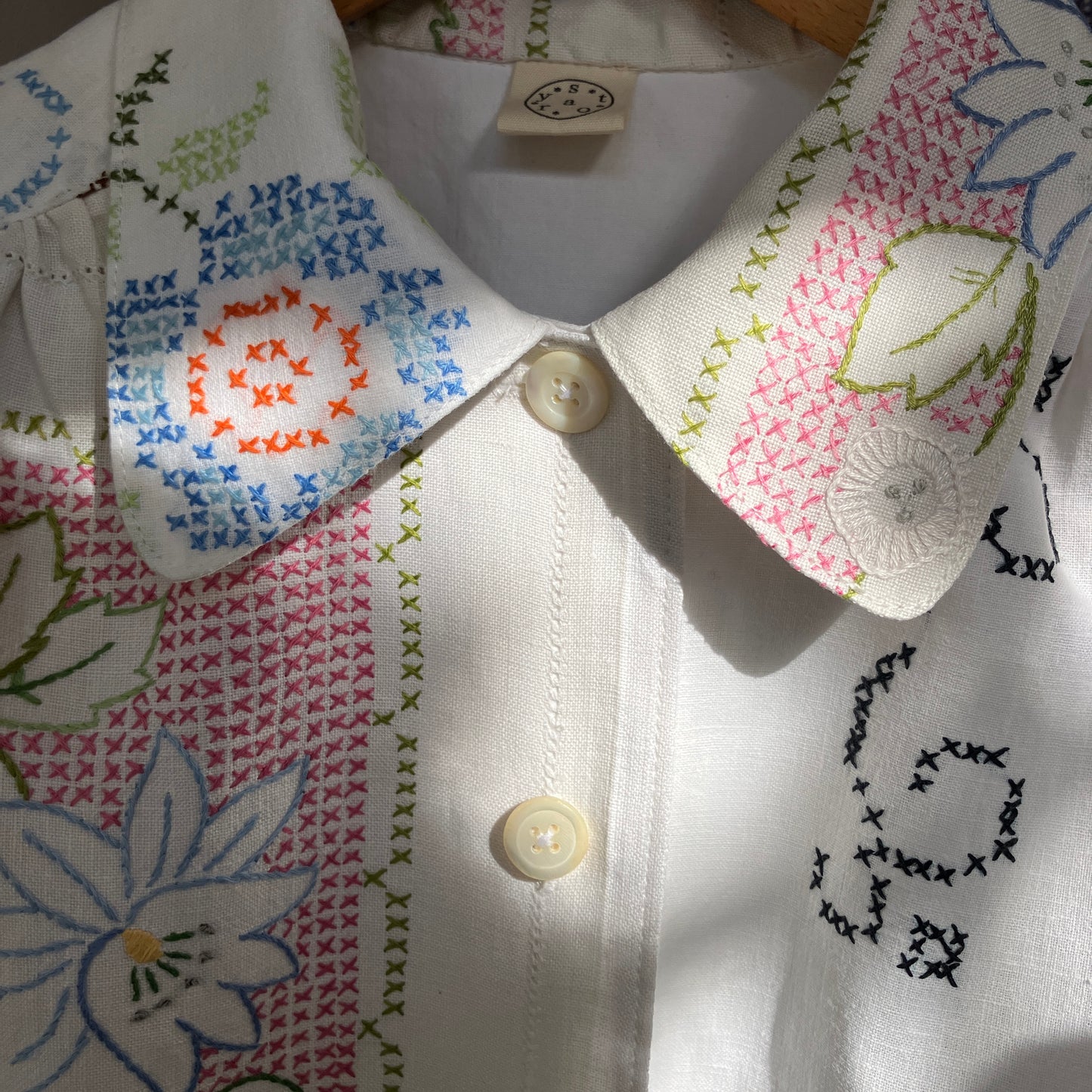 Recycled cross-stitch tablecloth shirt