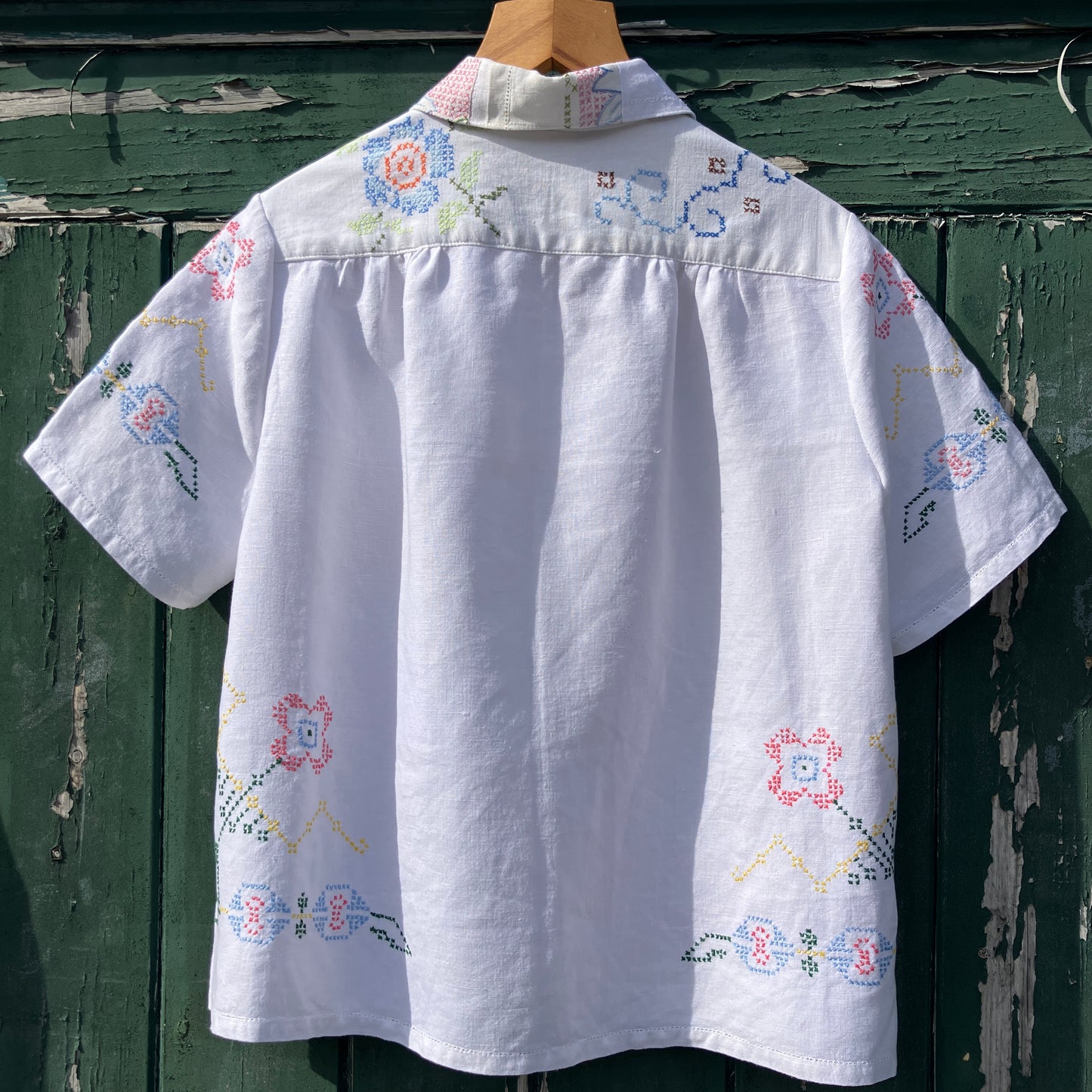 Recycled cross-stitch tablecloth shirt
