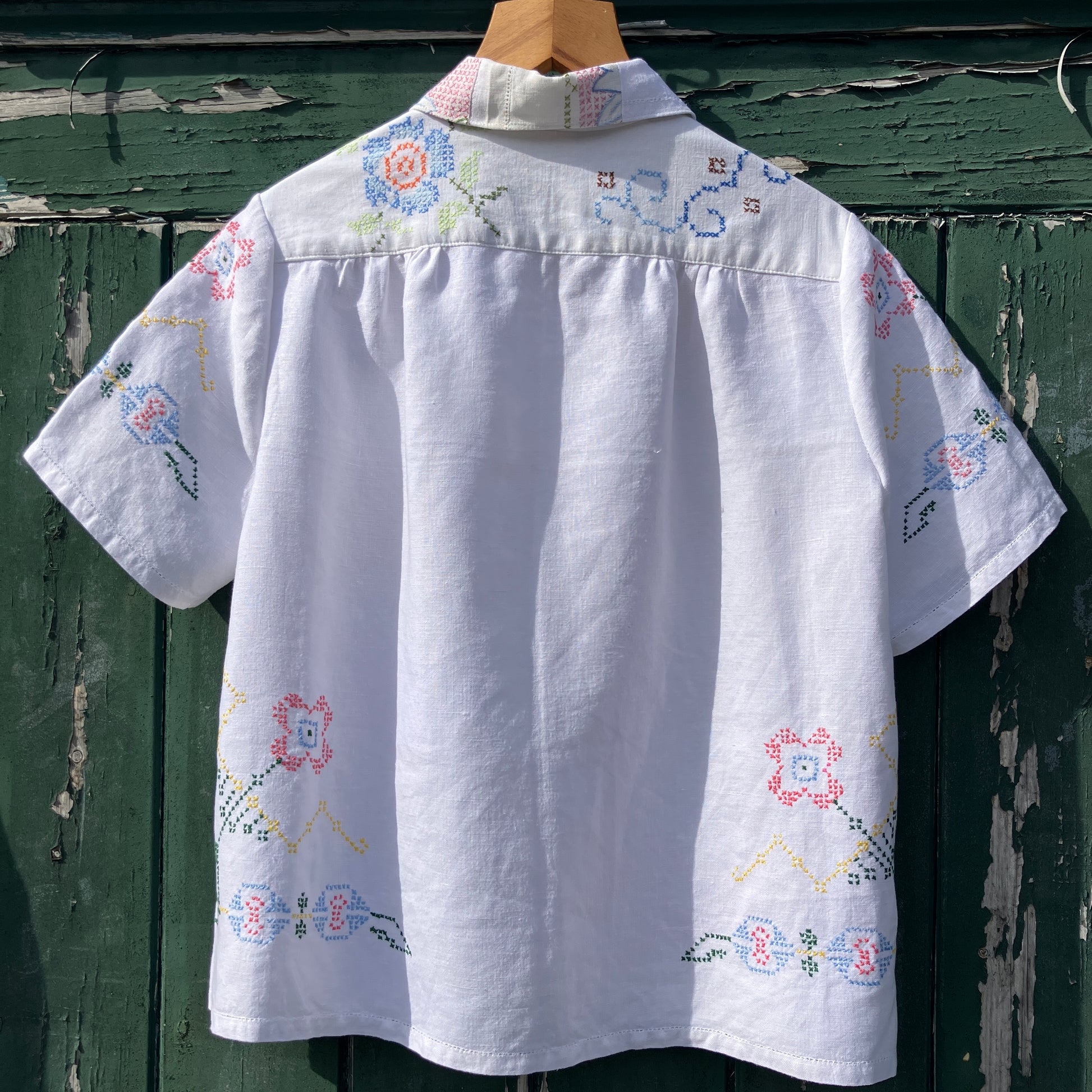 Recycled cross-stitch tablecloth shirt
