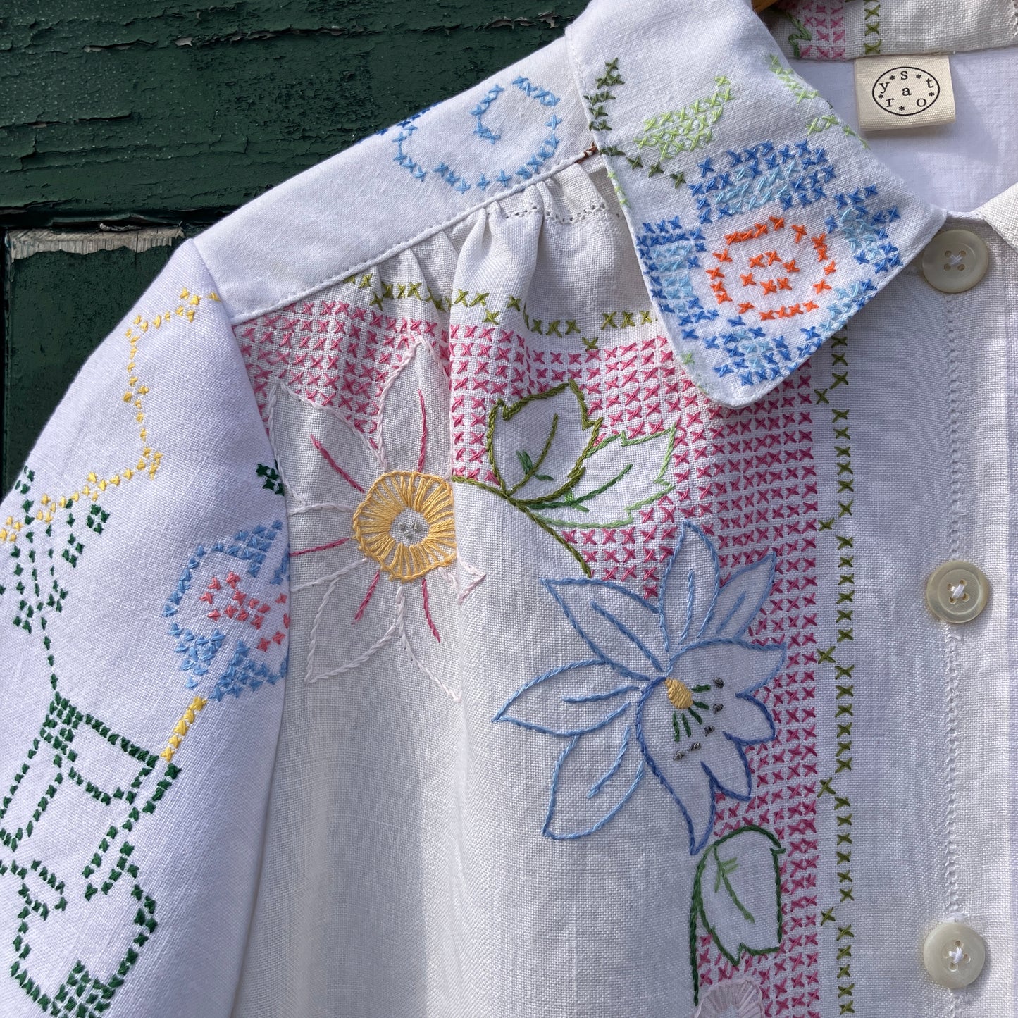 Recycled cross-stitch tablecloth shirt