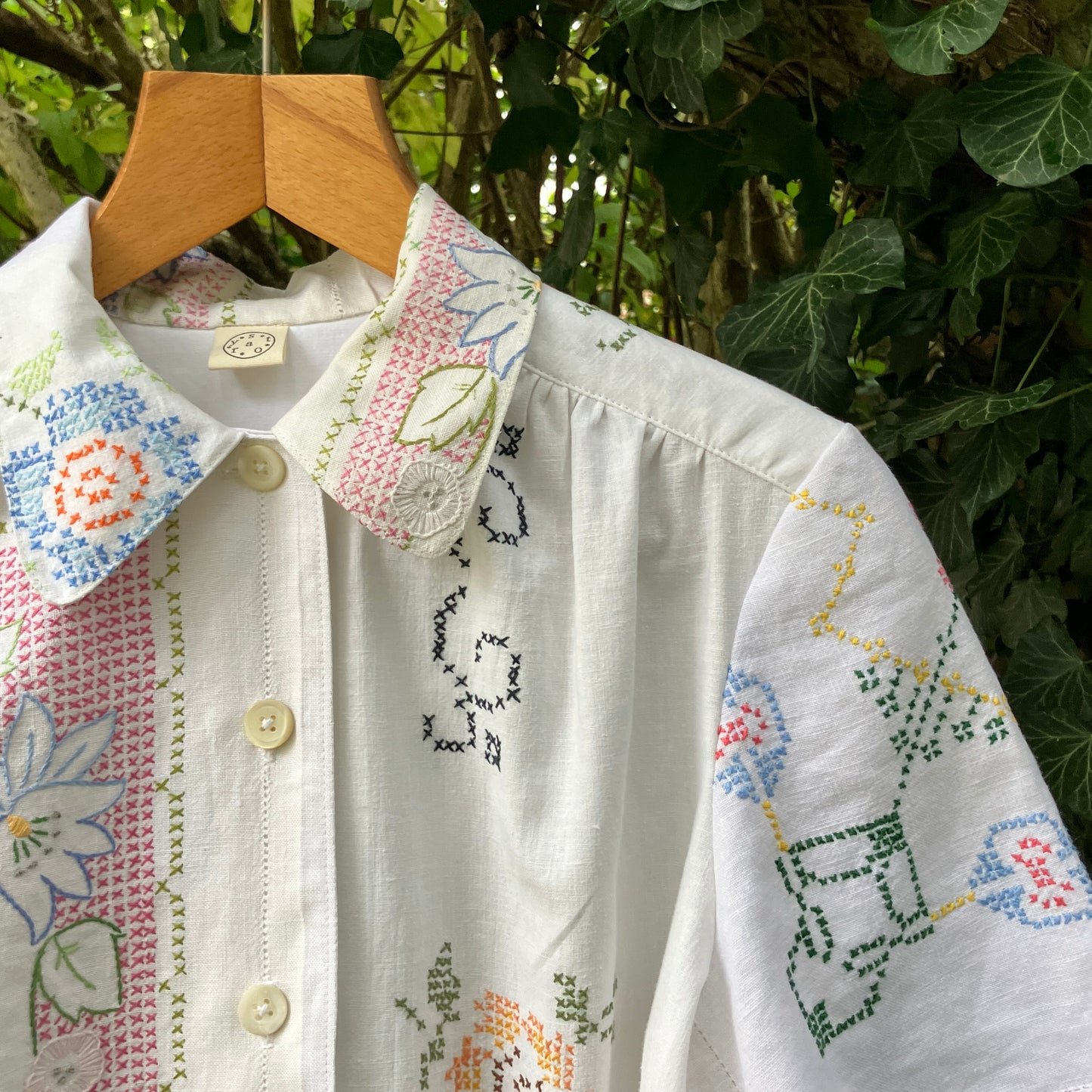 Recycled cross-stitch tablecloth shirt