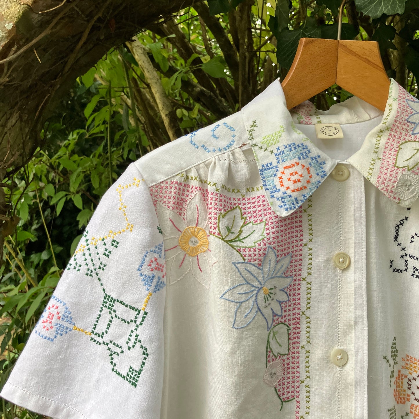 Recycled cross-stitch tablecloth shirt