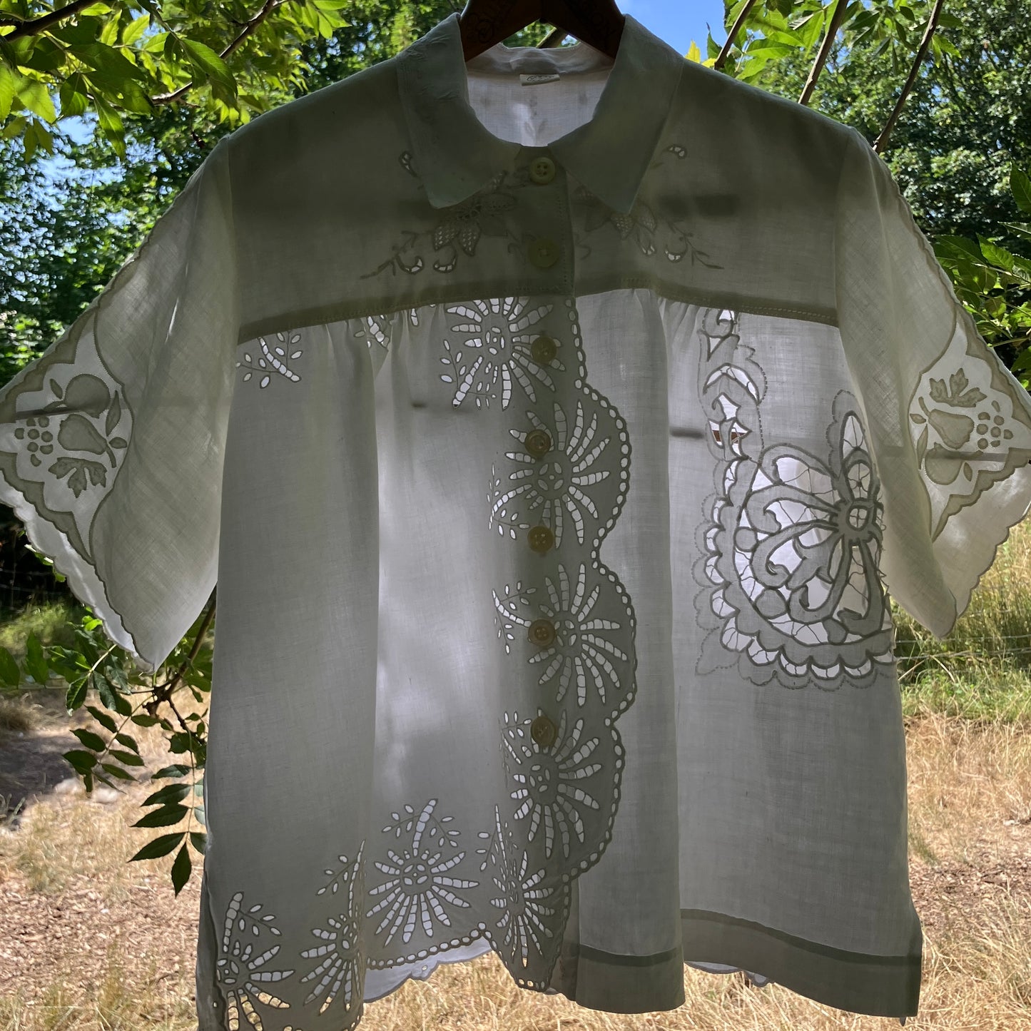 shirt made from a patchwork of recycled vintage white table linen