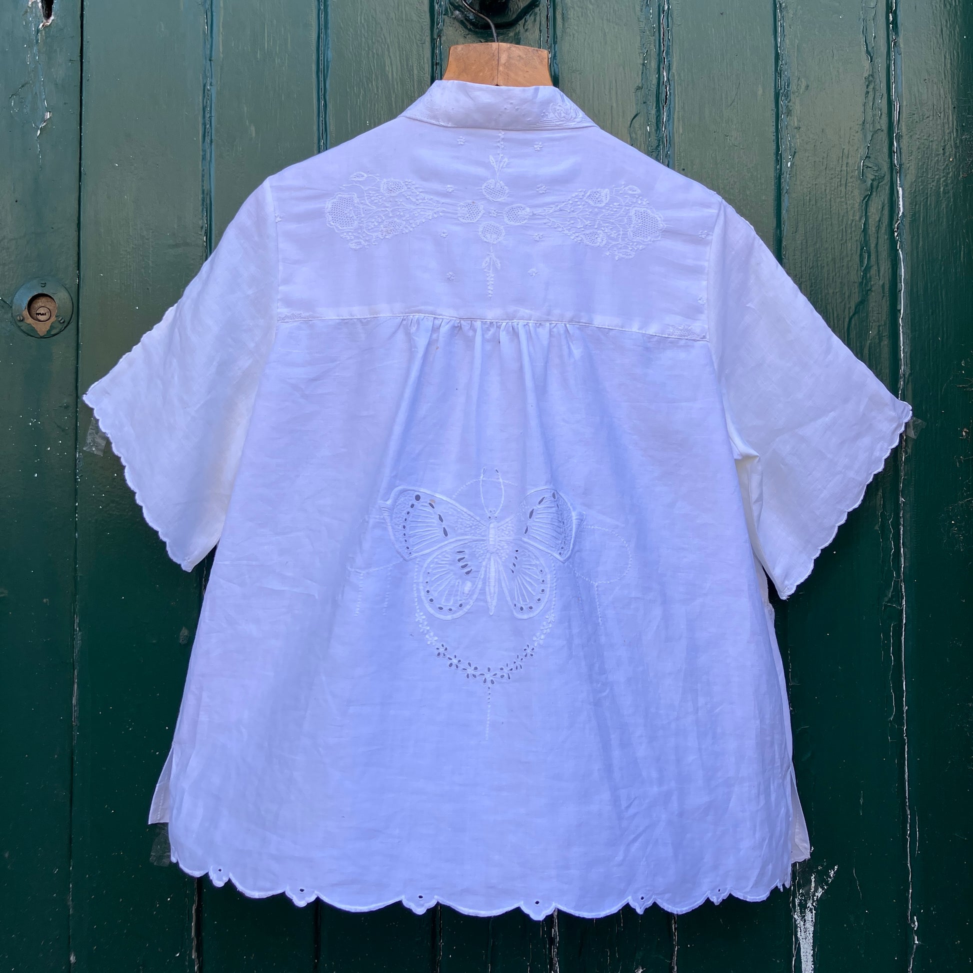 shirt made from a patchwork of recycled vintage white table linen